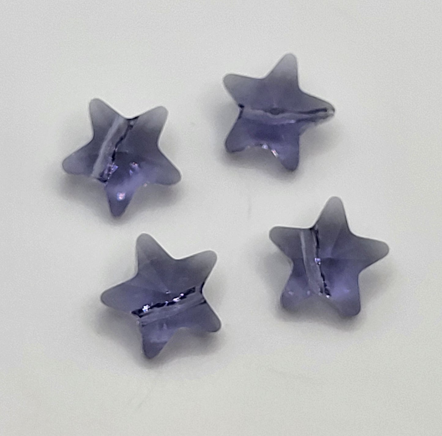 #5714 - 4pc Swarovski Crystal Tanzanite 12mm Star Bead; LAST ONE