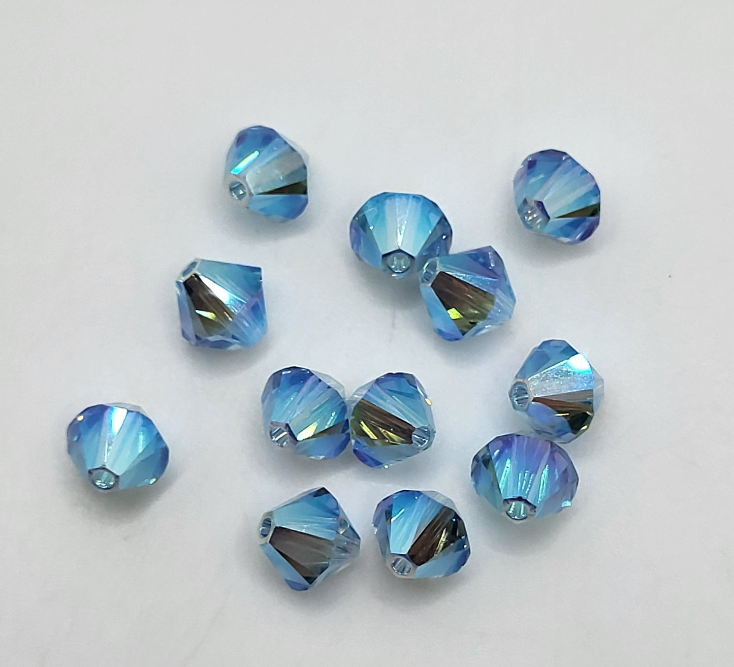 #5328 - 12pc Swarovski Crystal Aquamarine AB2X 6mm Bicone Beads; LAST ONE