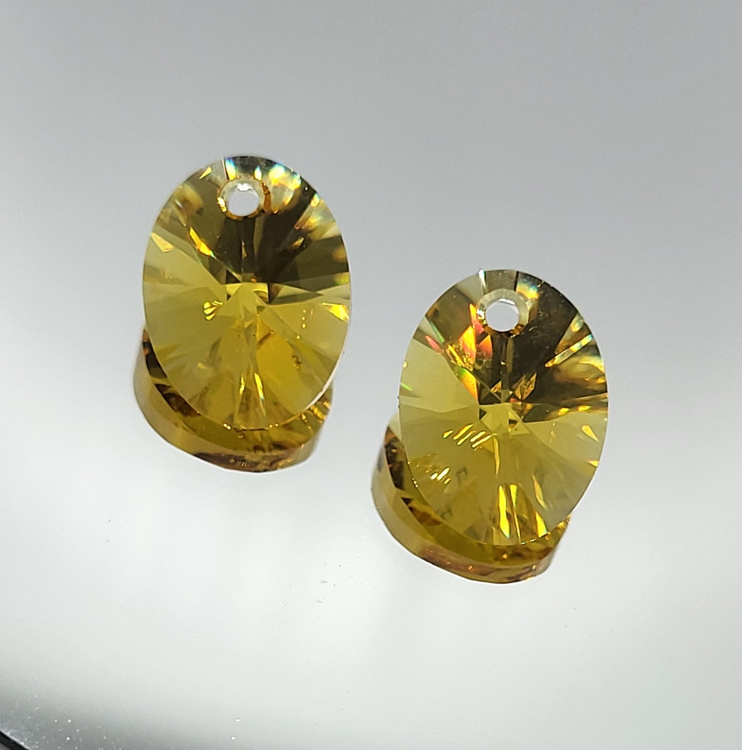 #6028 - 2pc Swarovski Crystal Sunflower 10x8mm Oval Pendant; LAST ONE