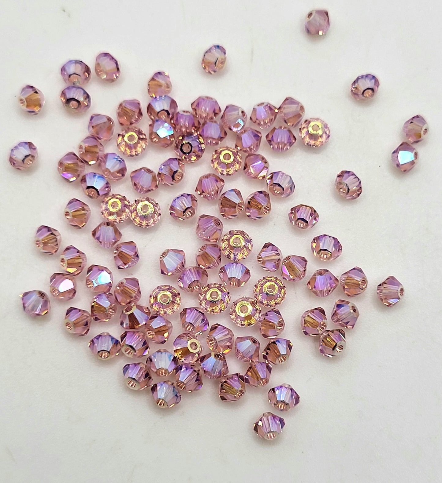 #5328 - Swarovski Crystal 3mm Bicones w/ AB2X Finish; 24pc per pack
