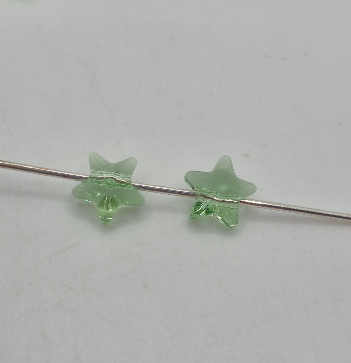 #5714 - Swarovski Crystal 8mm Peridot Star Beads; 6pc per pack