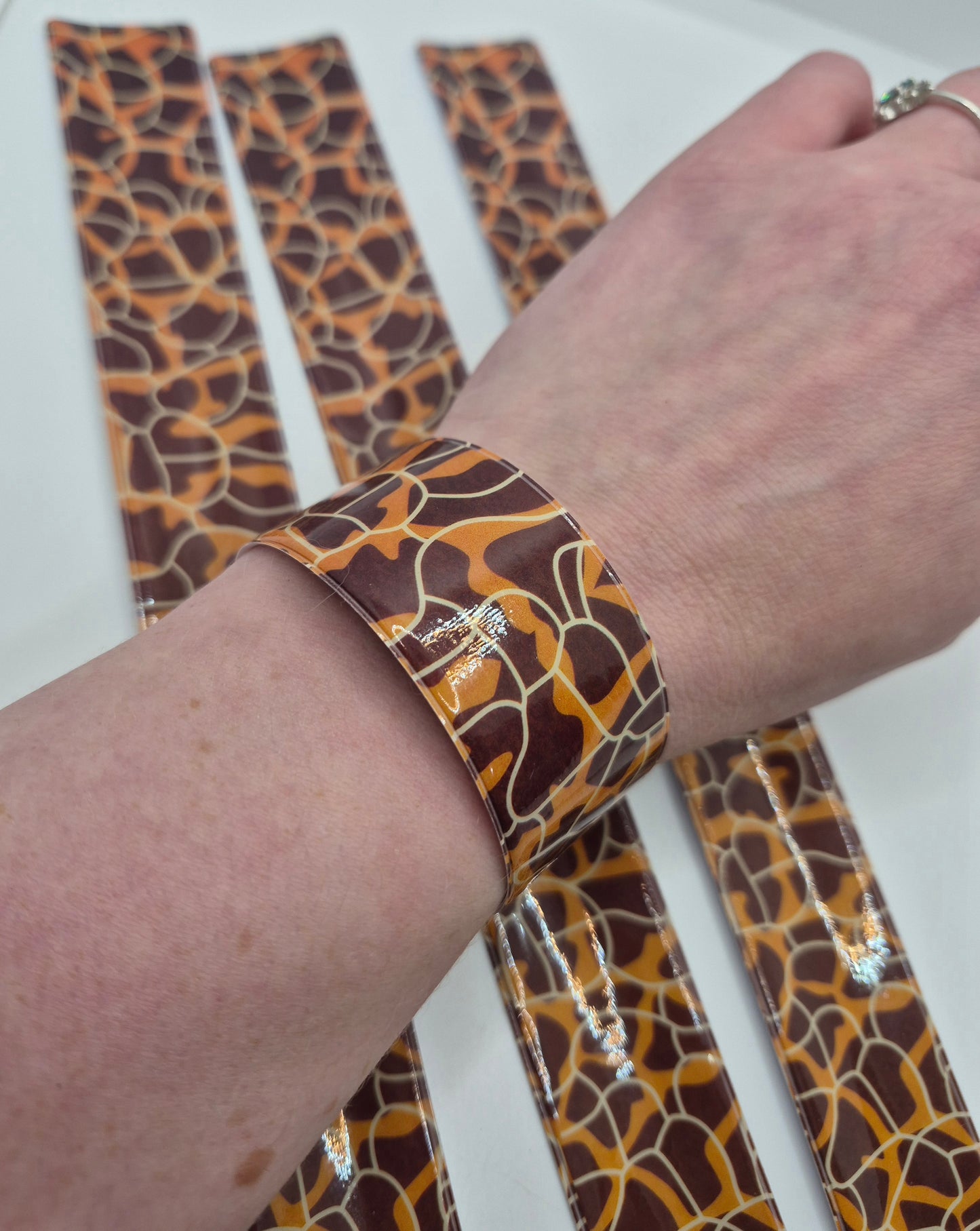 AMAZING DEAL! 4-pack Giraffe Print Slap On Bracelets