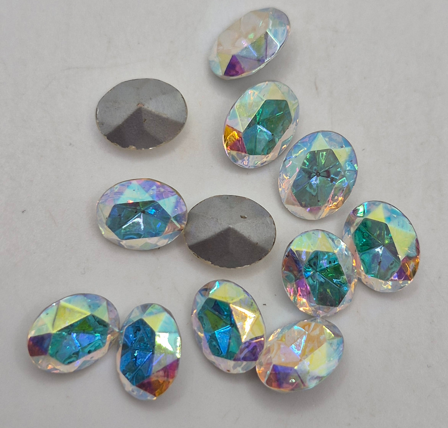 #4130/2 - 12pc Swarovski Crystal Clear AB 10x8mm Oval Fancy Stones; LAST ONE