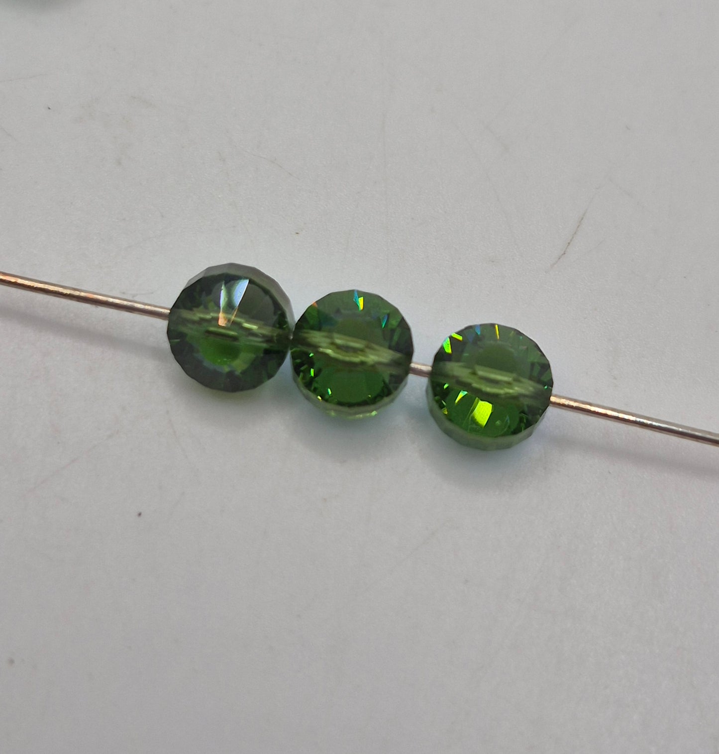 #5101 - Swarovski Crystal Green Turmaline AB 8mm Tablet Beads; 12pc per pack