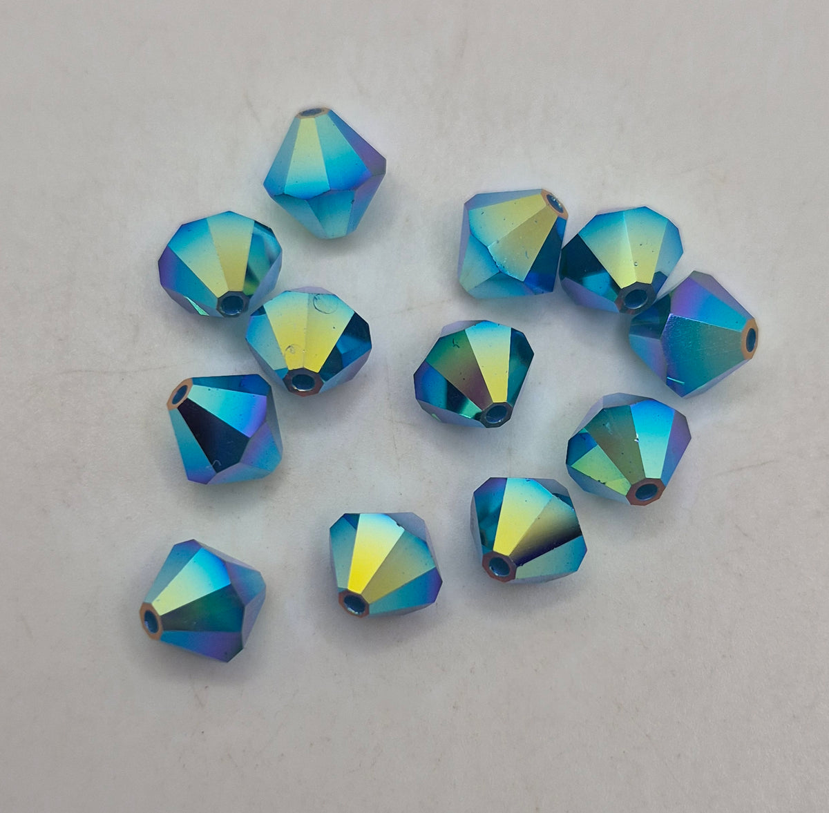 #5328 - 12pc Swarovski Crystal Caribbean Blue Opal AB2X 8mm Bicone Beads; LAST ONE
