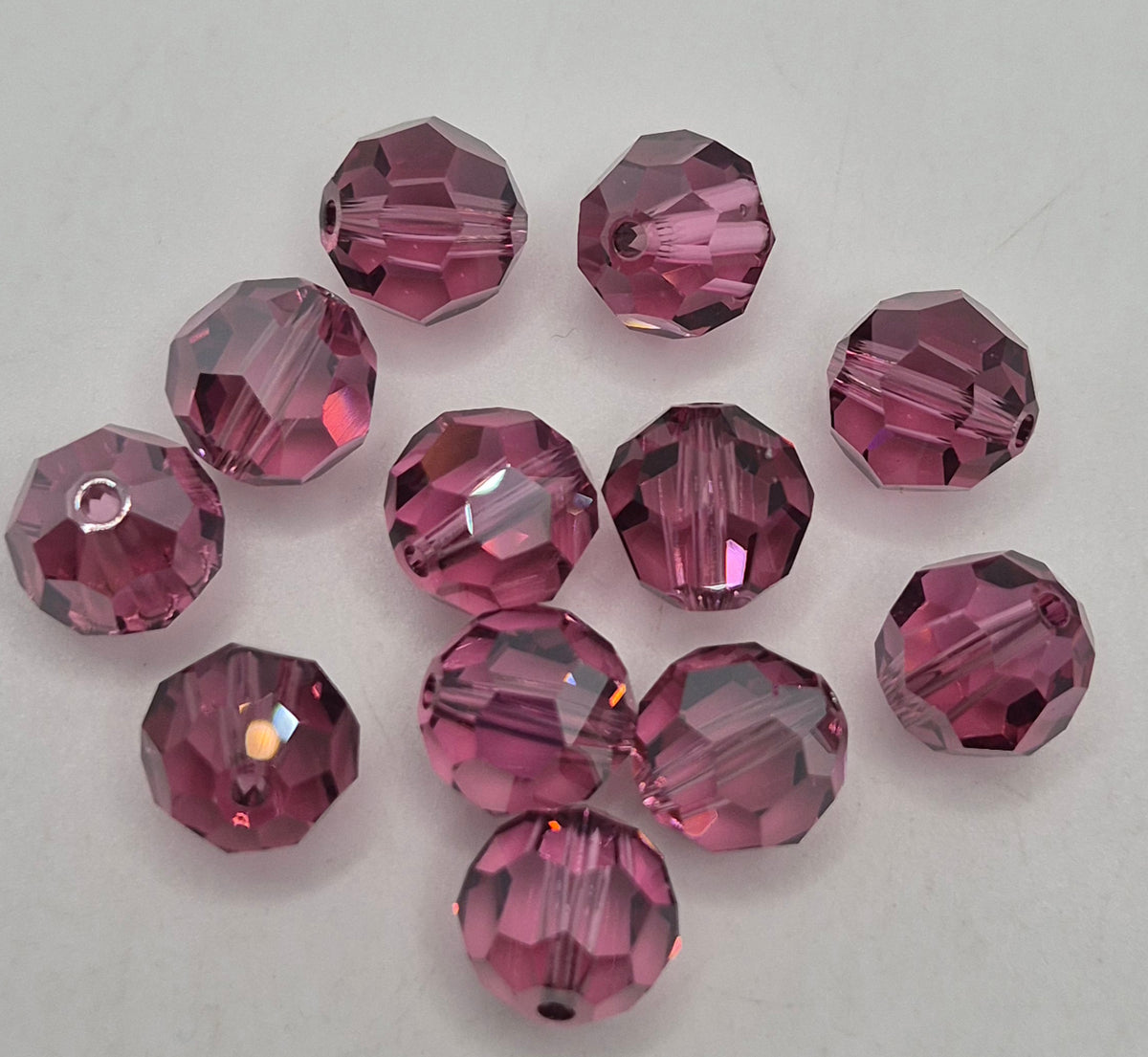 #5000 - 12pc Swarovski Crystal Rose Satin 10mm Round Beads; LAST ONE