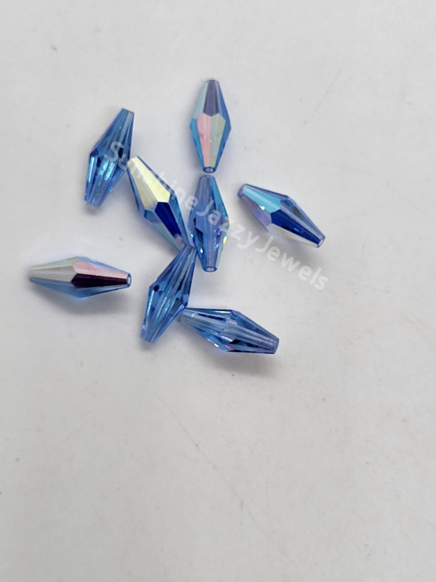 #5205 - Factory Pack Swarovski Crystal Light Sapphire AB 15x6mm Squared Tube Beads