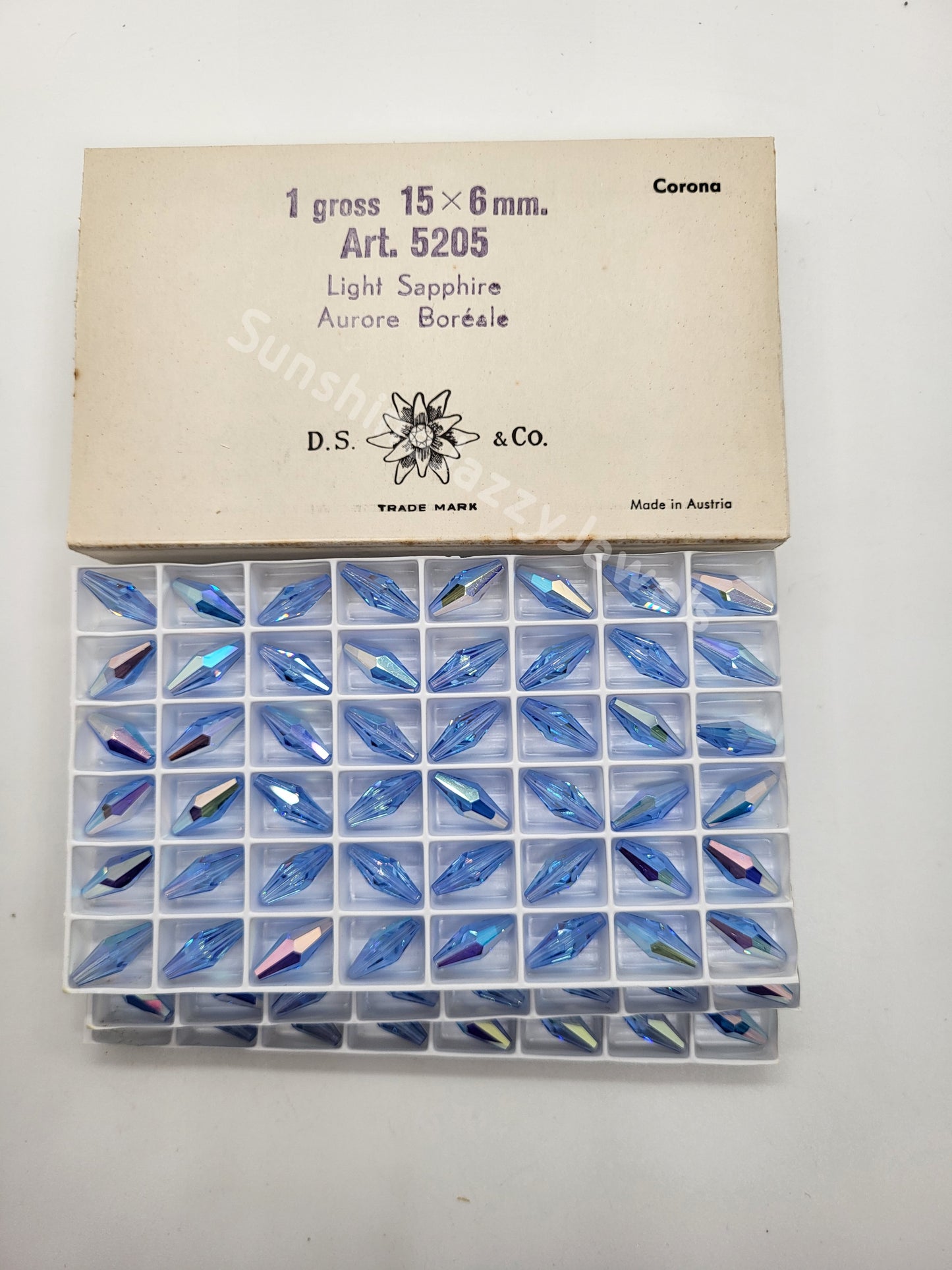 #5205 - Factory Pack Swarovski Crystal Light Sapphire AB 15x6mm Squared Tube Beads