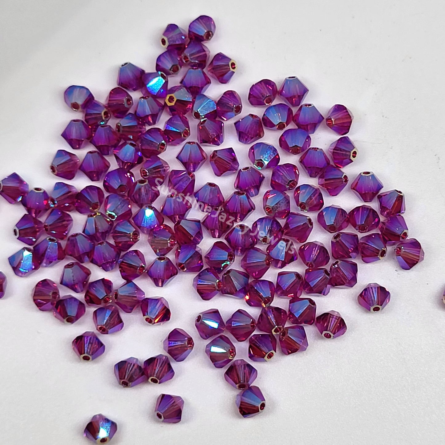 #5328 - Swarovski Crystal 4mm AB2X Bicone Beads; 24pc per pack