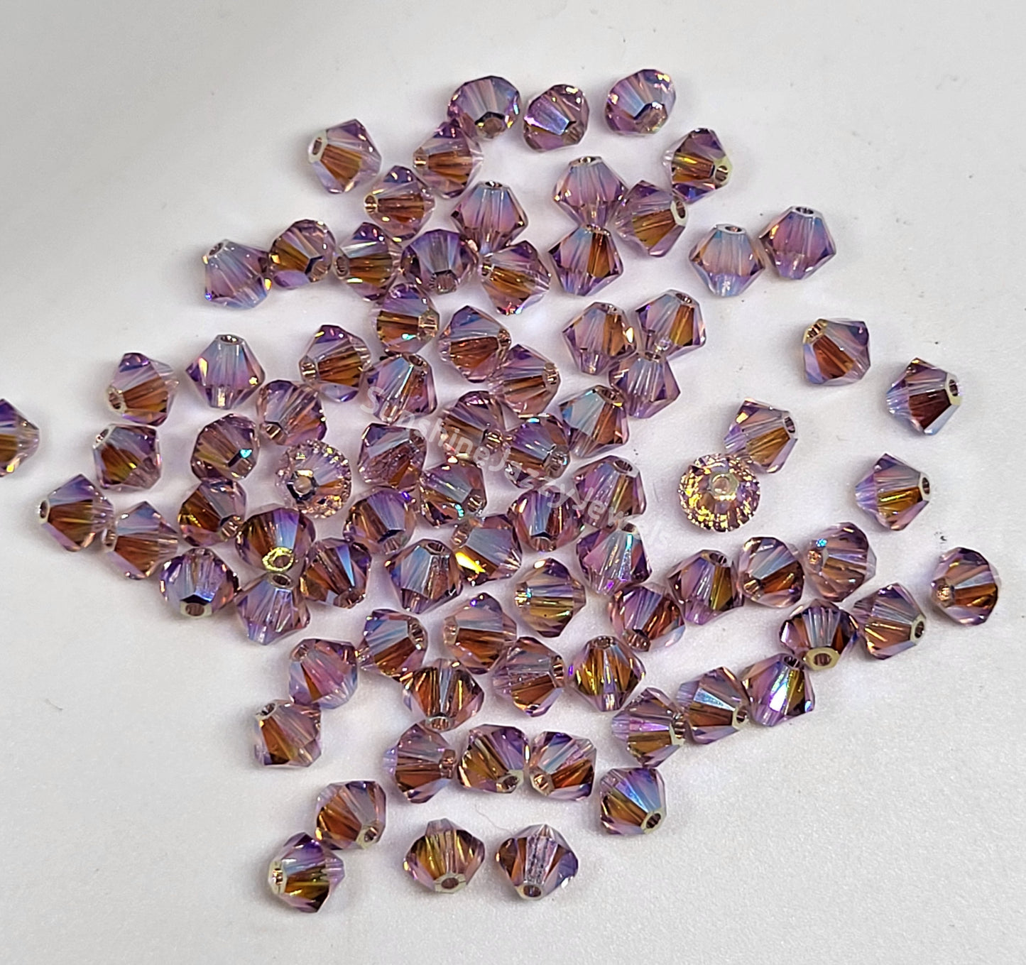 #5328 - Swarovski Crystal 4mm AB2X Bicone Beads; 24pc per pack