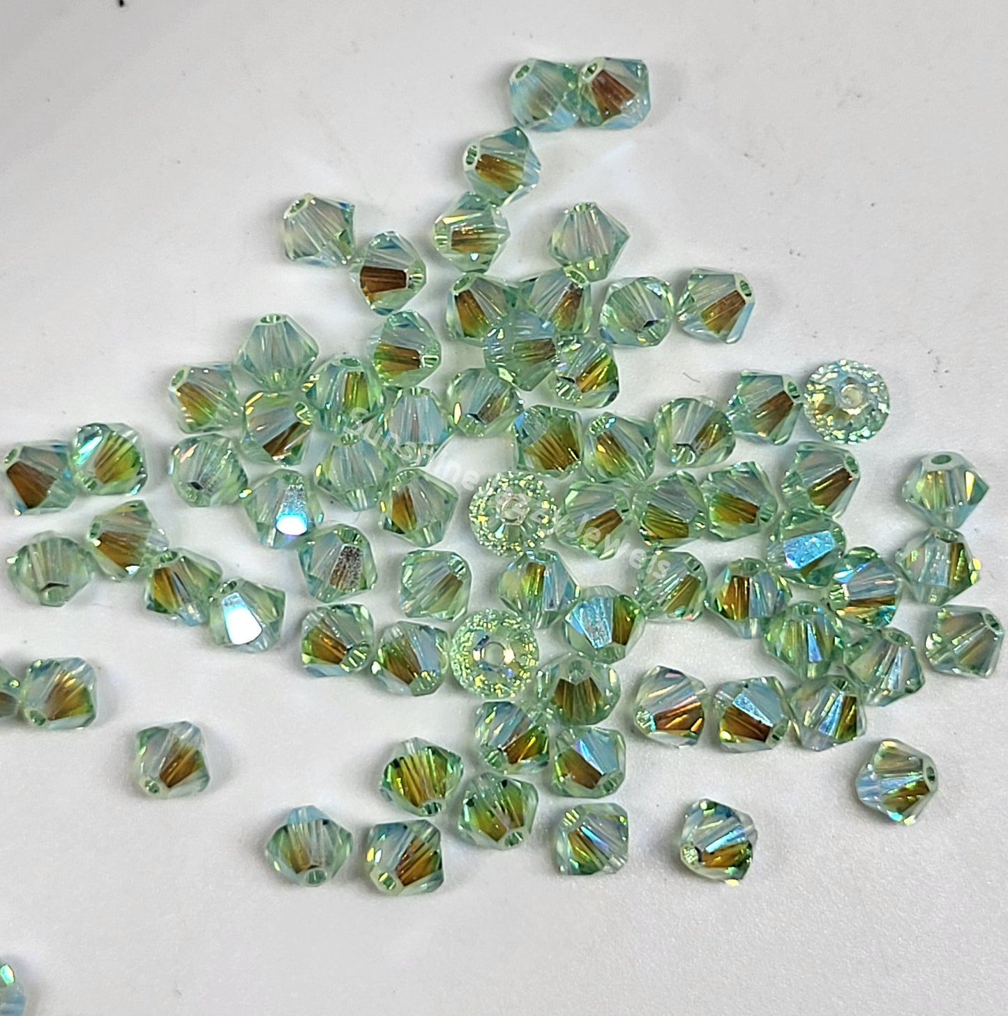 #5328 - Swarovski Crystal 4mm AB2X Bicone Beads; 24pc per pack