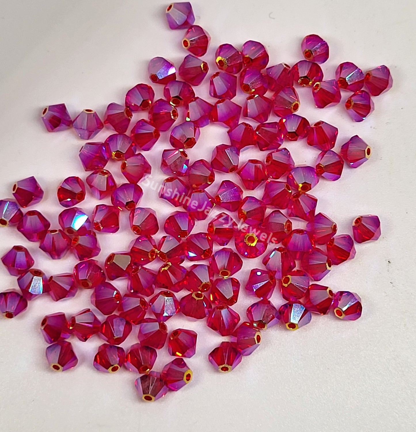 #5328 - Swarovski Crystal 4mm AB2X Bicone Beads; 24pc per pack