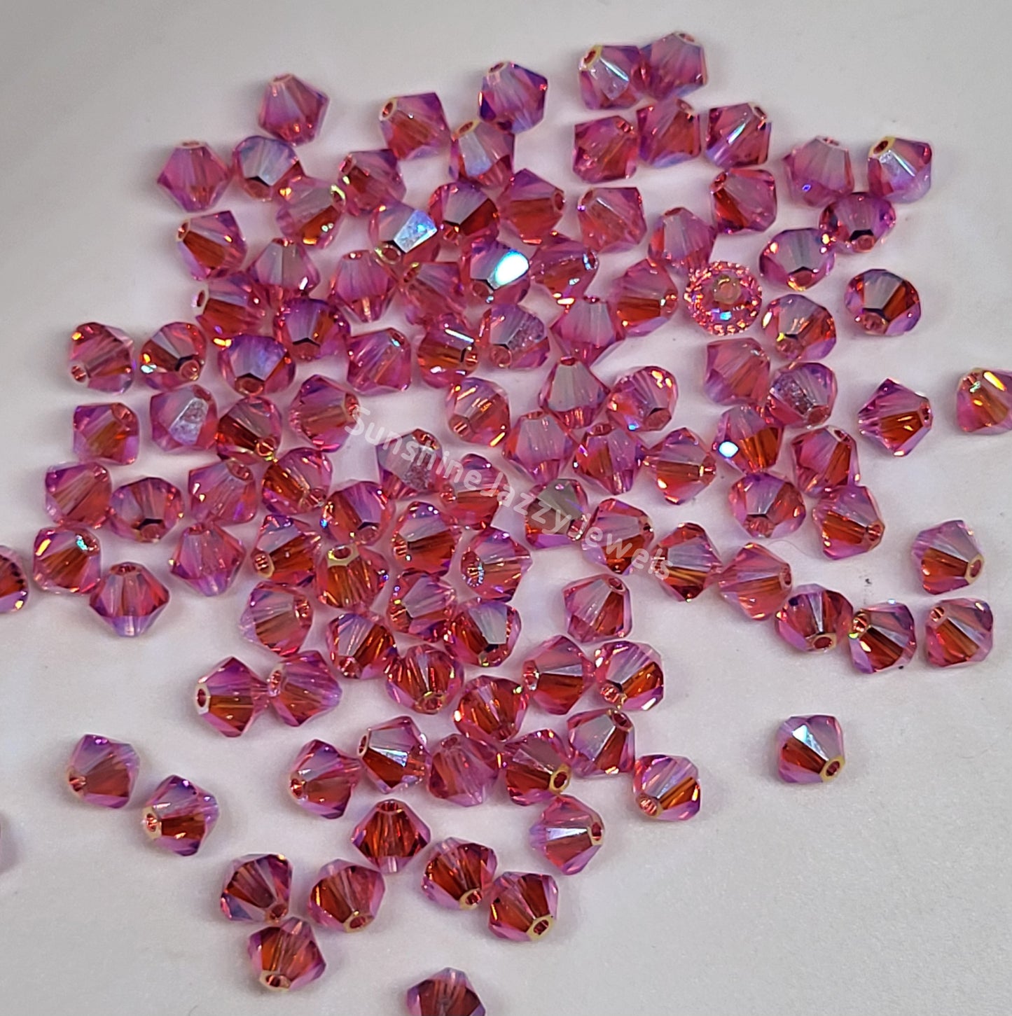 #5328 - Swarovski Crystal 4mm AB2X Bicone Beads; 24pc per pack