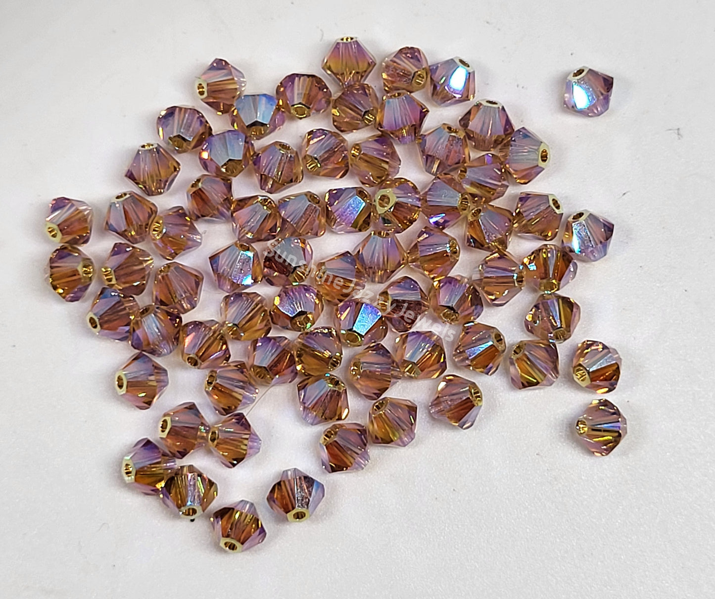 #5328 - Swarovski Crystal 4mm AB2X Bicone Beads; 24pc per pack
