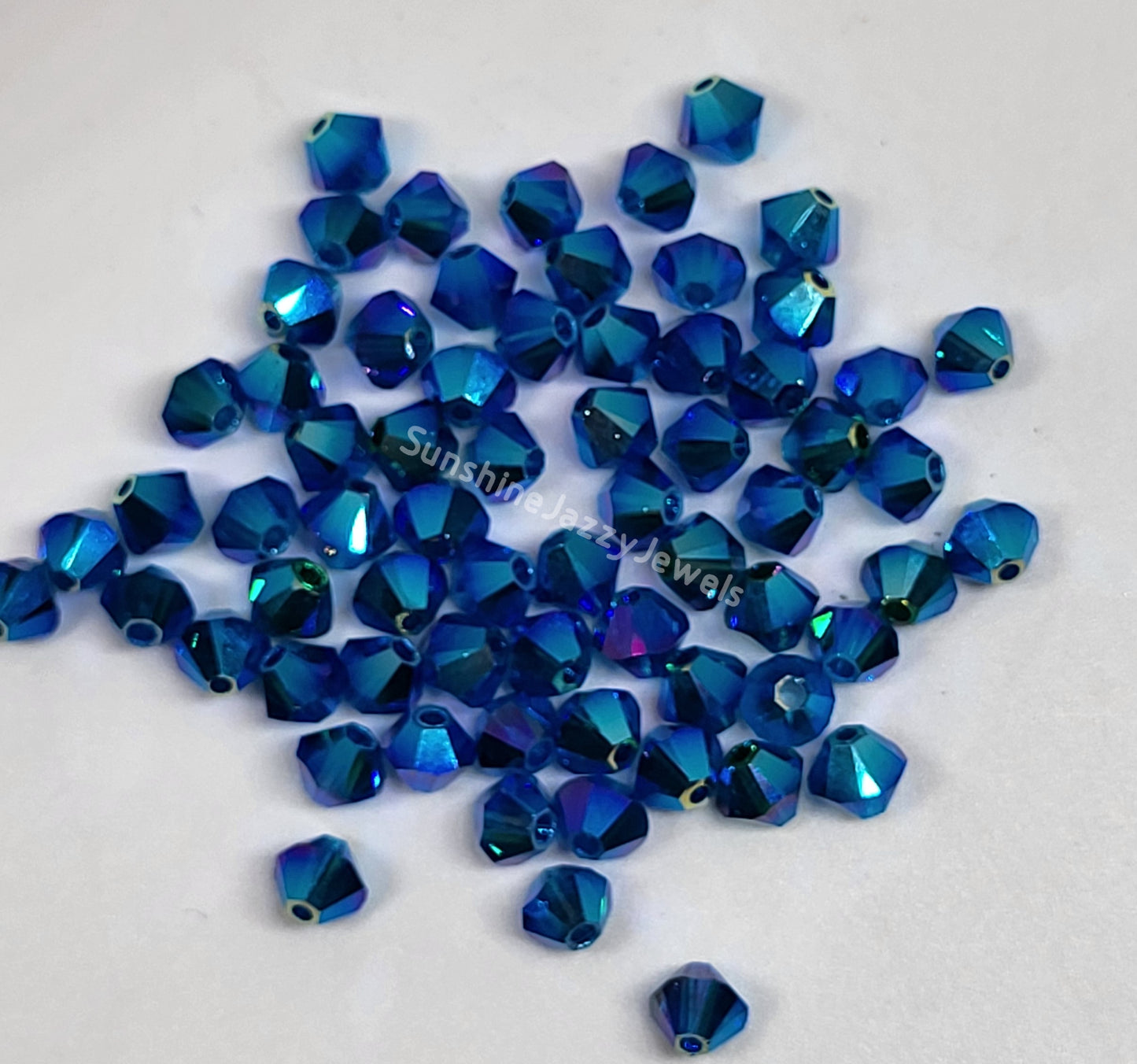 #5328 - Swarovski Crystal 4mm AB2X Bicone Beads; 24pc per pack