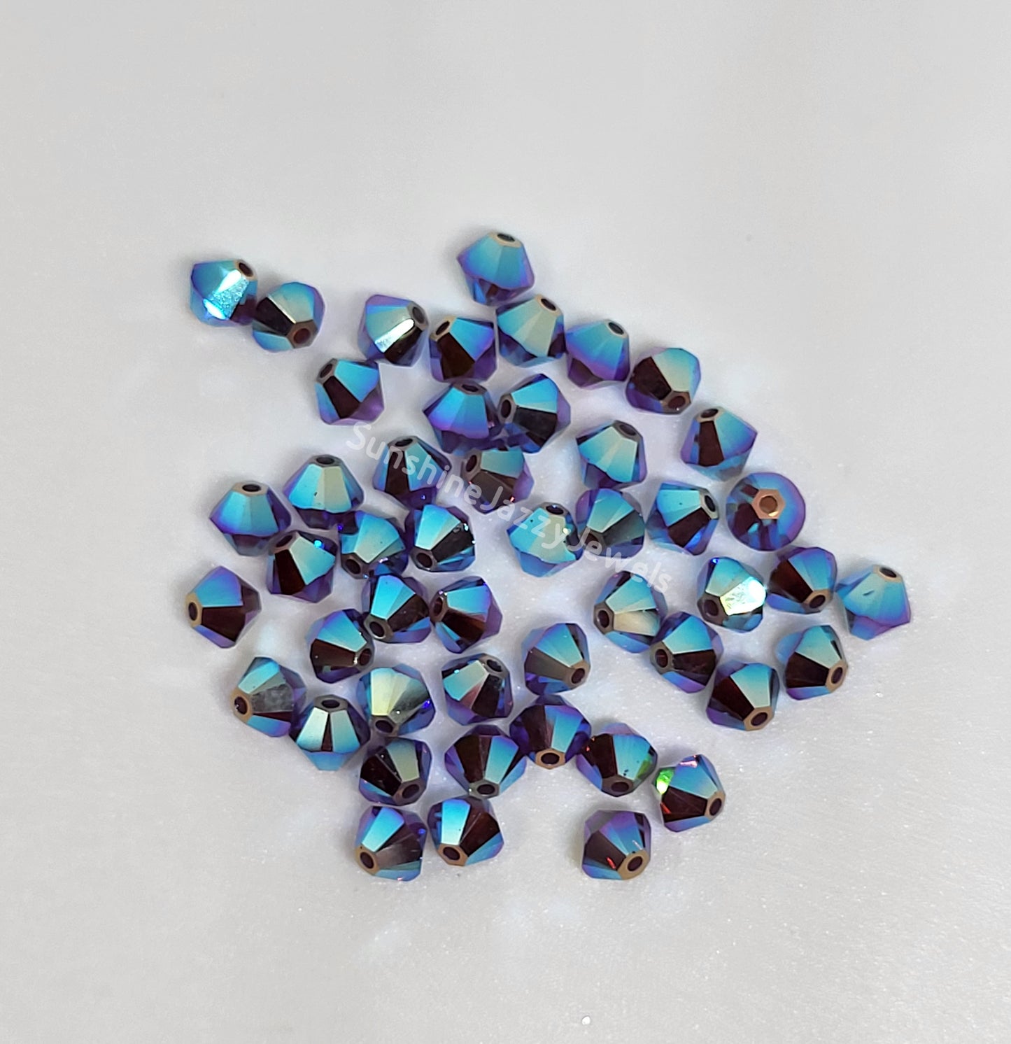 #5328 - Swarovski Crystal 4mm AB2X Bicone Beads; 24pc per pack
