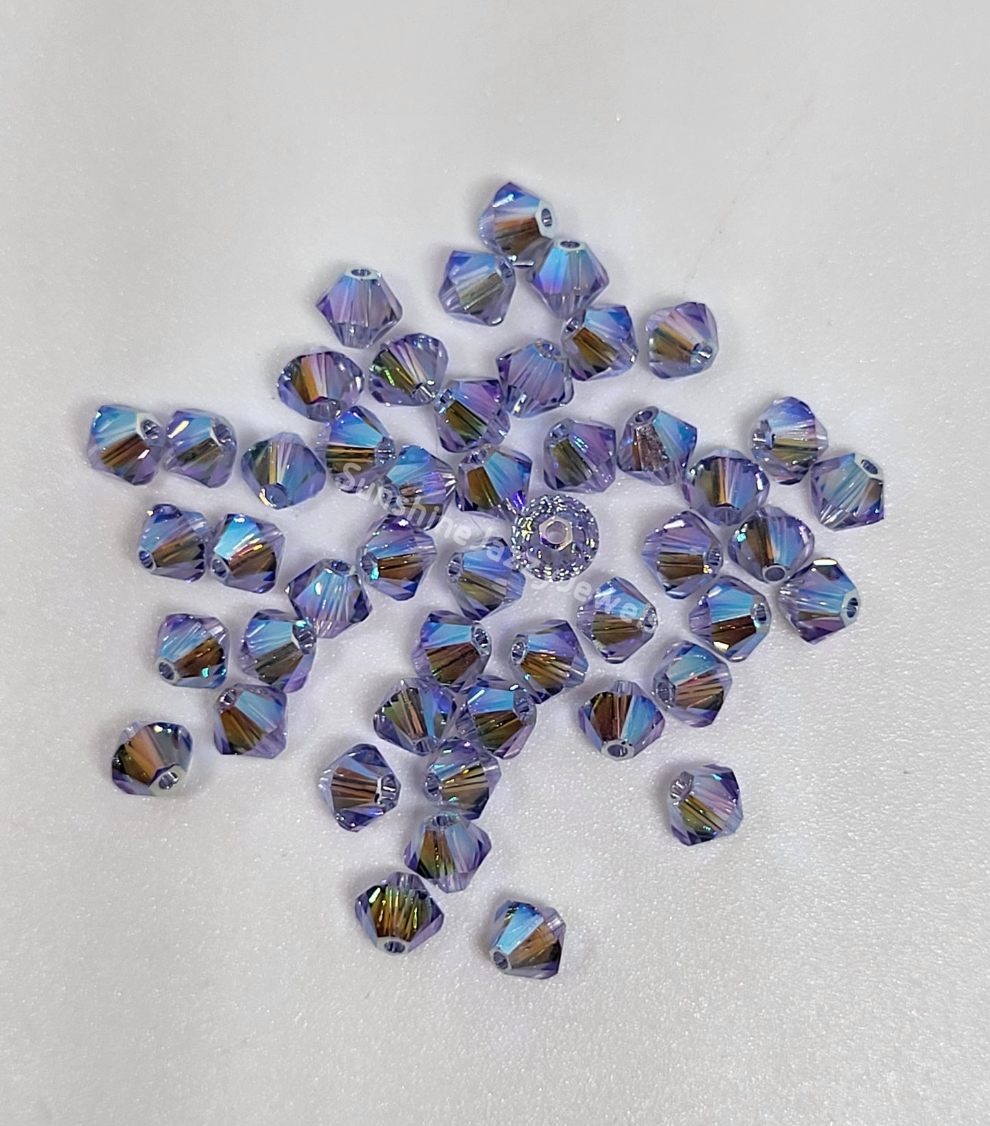 #5328 - Swarovski Crystal 4mm AB2X Bicone Beads; 24pc per pack