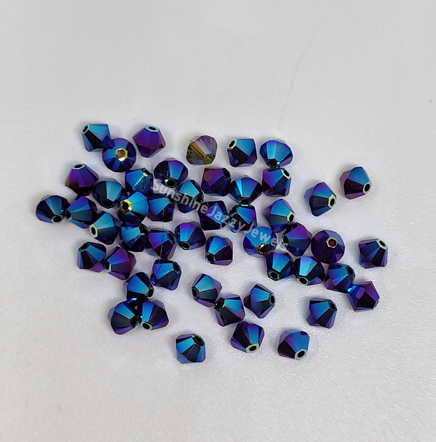 #5328 - Swarovski Crystal 4mm AB2X Bicone Beads; 24pc per pack