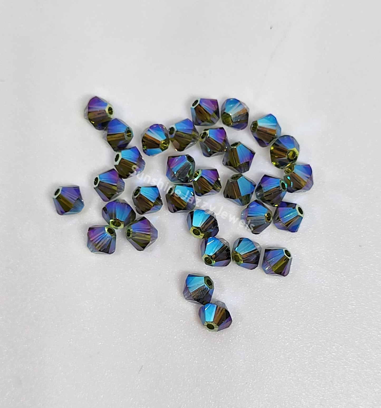 #5328 - Swarovski Crystal 4mm AB2X Bicone Beads; 24pc per pack