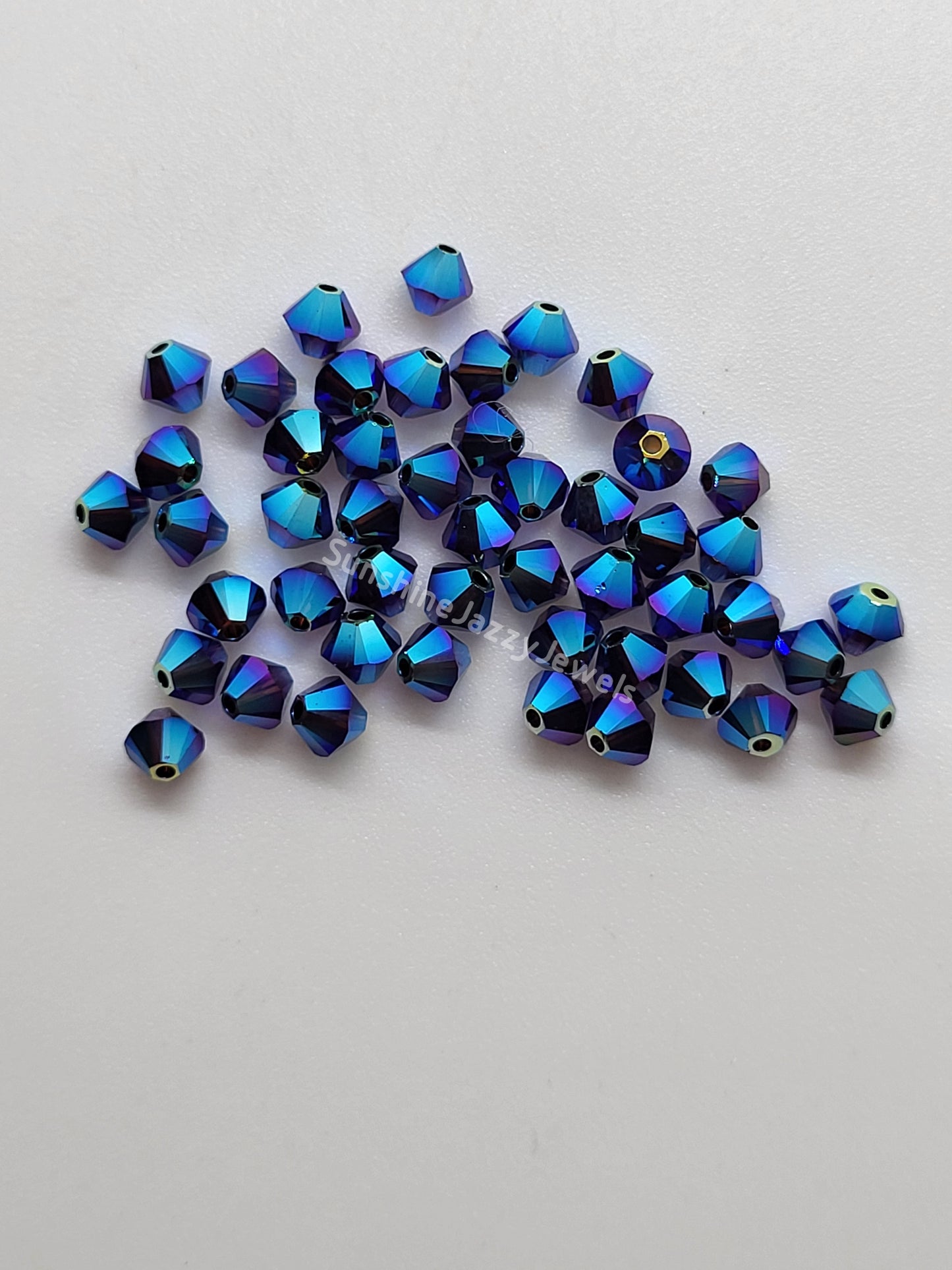 #5328 - Swarovski Crystal 4mm AB2X Bicone Beads; 24pc per pack