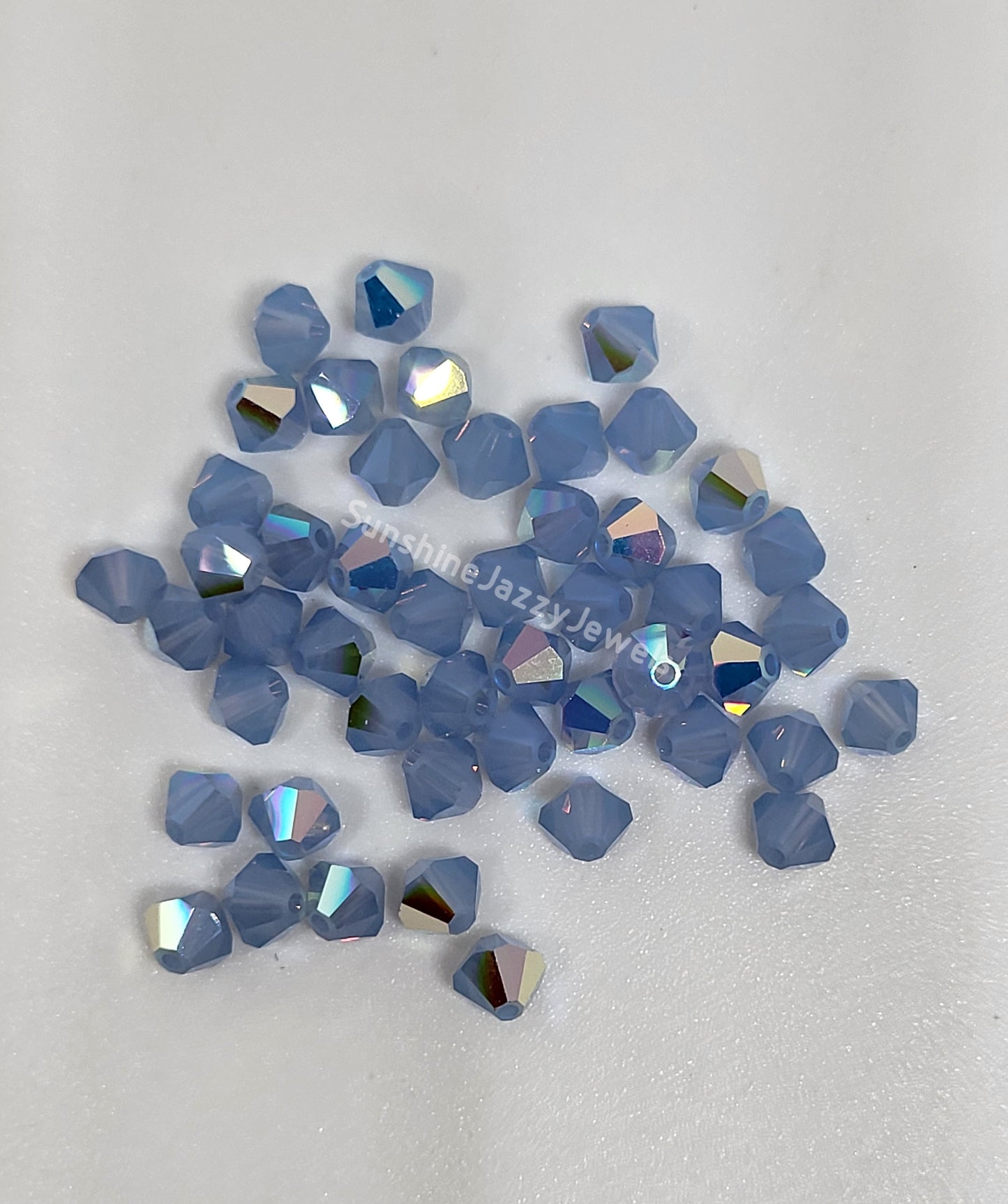 #5328 - Swarovski Crystal 4mm Bicones - Opal Finish; 24pc per pack