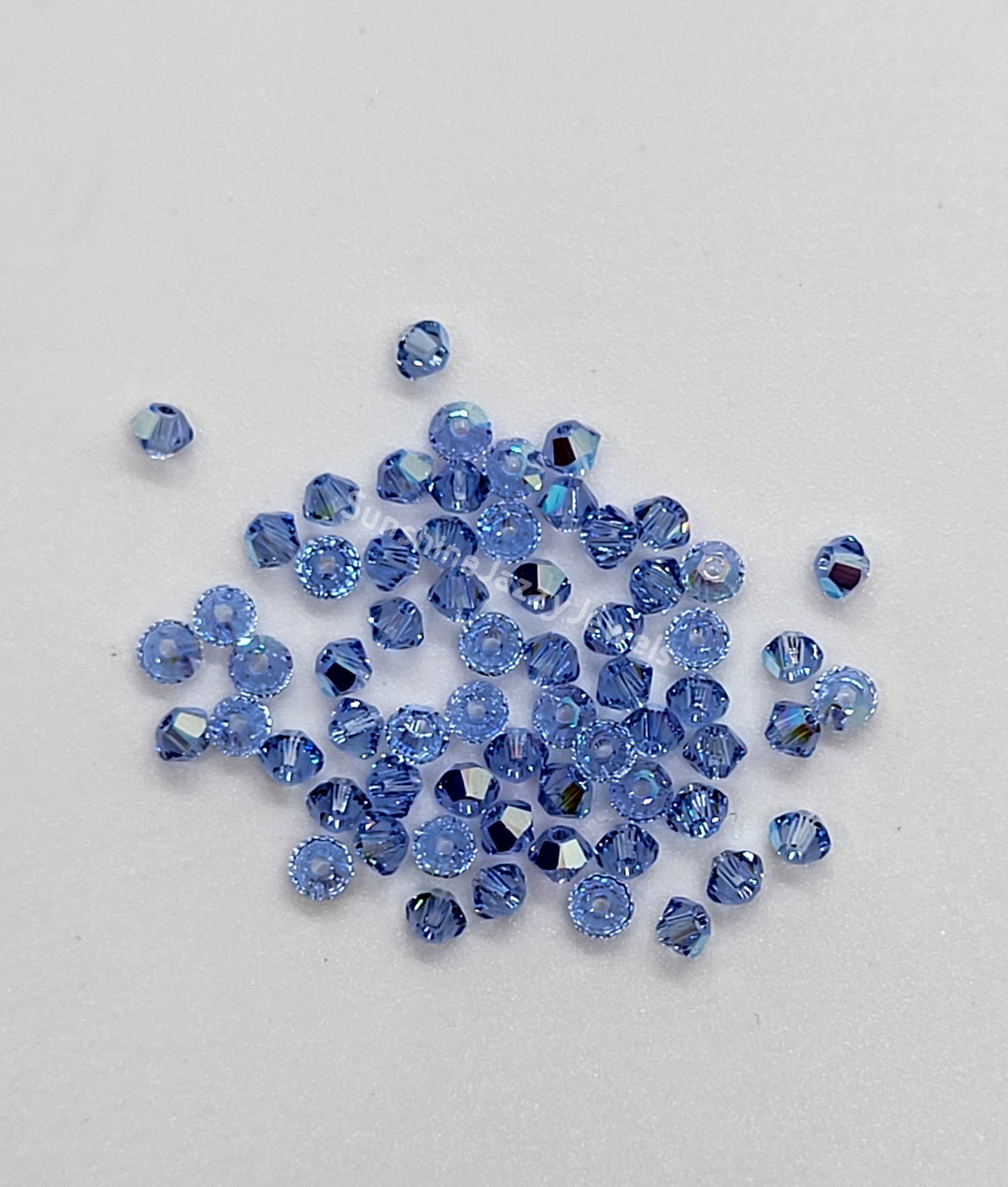 #5328 - Swarovski Crystal 3mm Bicone Beads w/ AB Finish