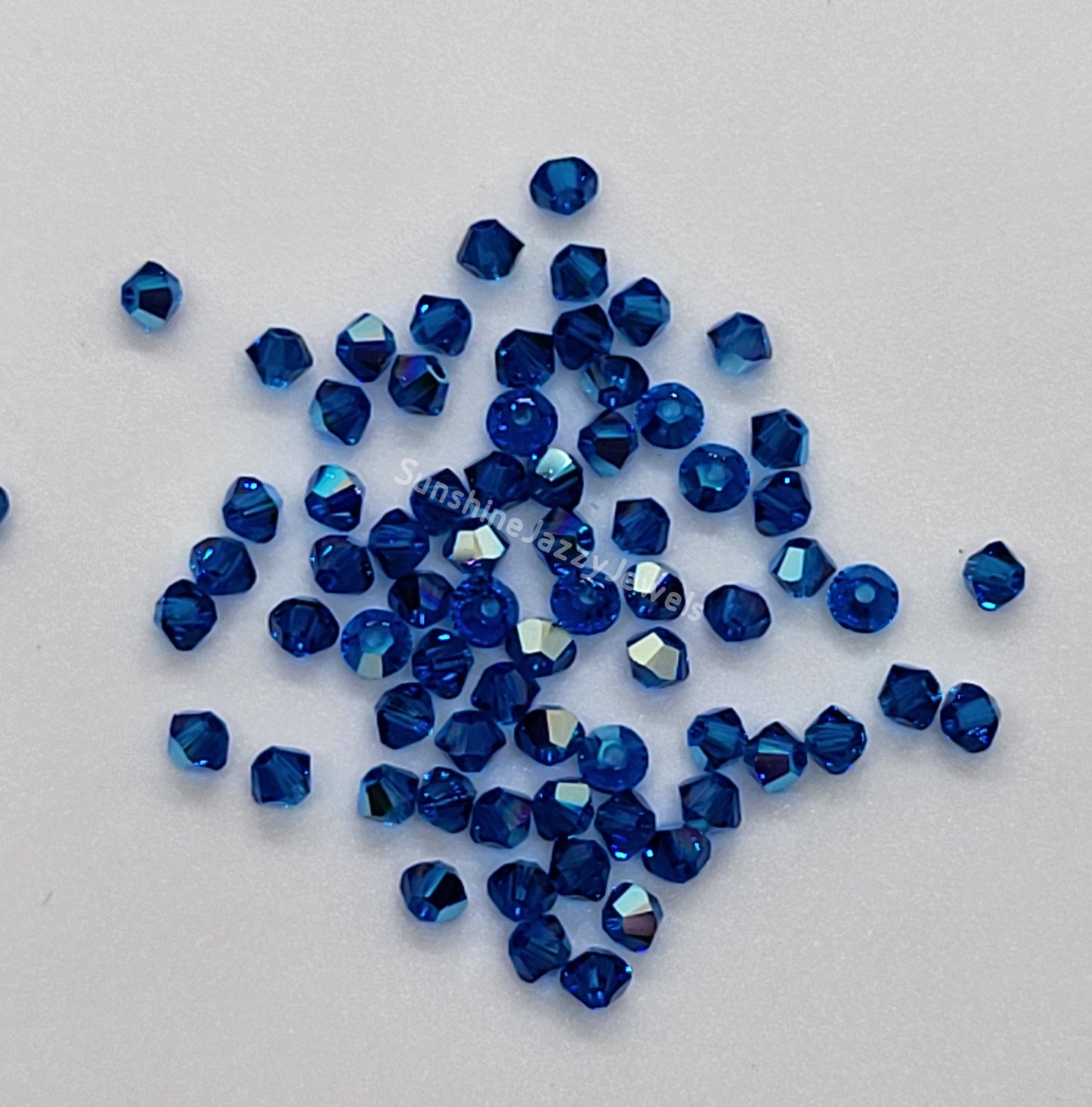 #5328 - Swarovski Crystal 3mm Bicone Beads w/ AB Finish