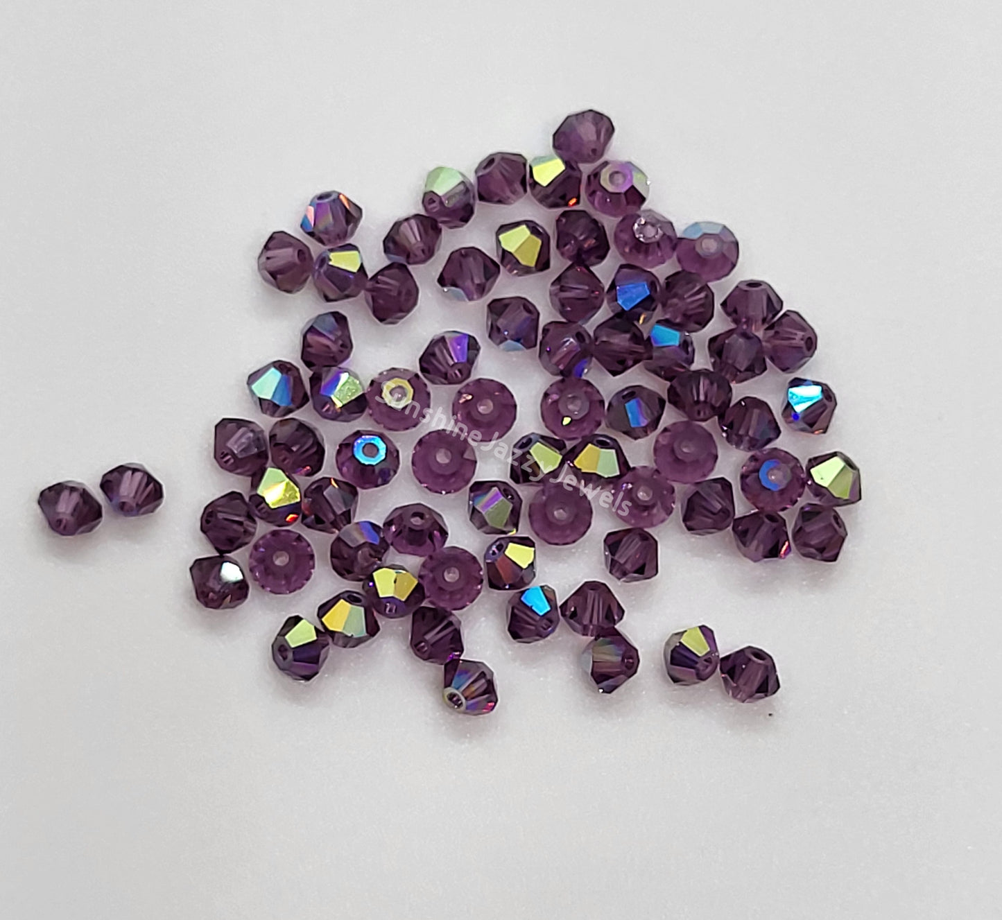 #5328 - Swarovski Crystal 3mm Bicone Beads w/ AB Finish