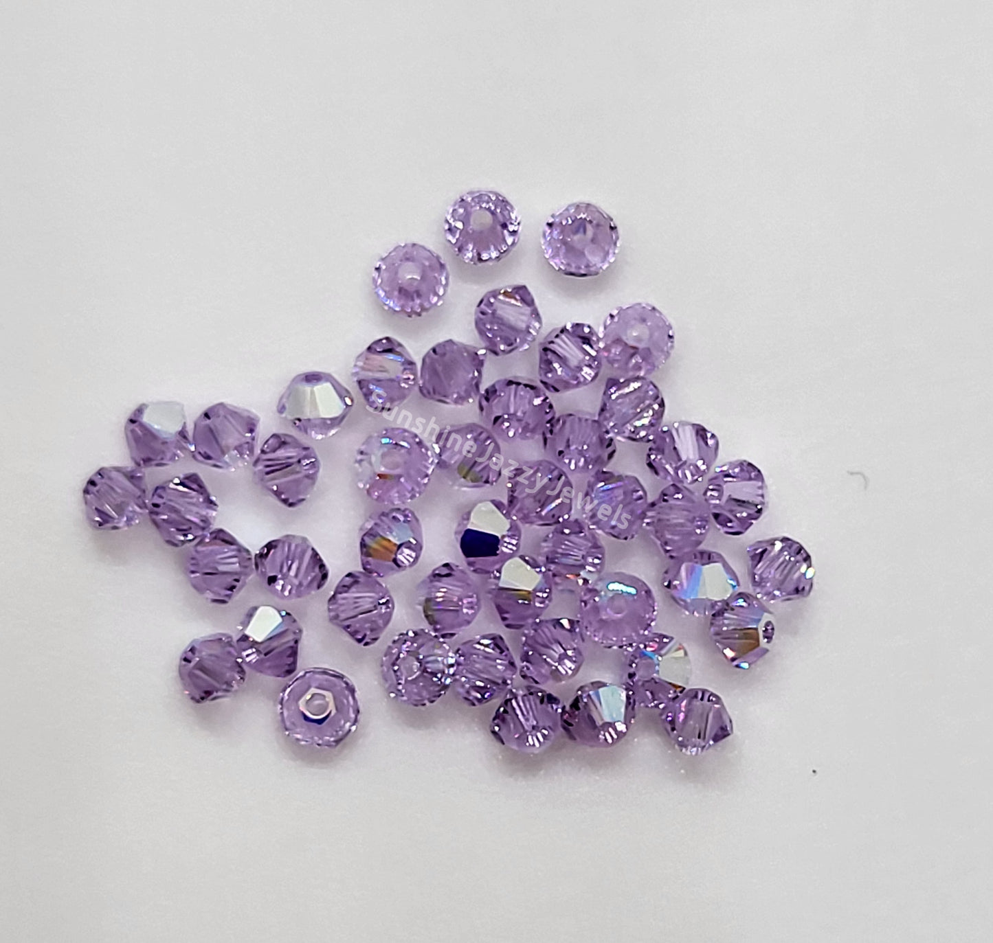 #5328 - Swarovski Crystal 3mm Bicone Beads w/ AB Finish