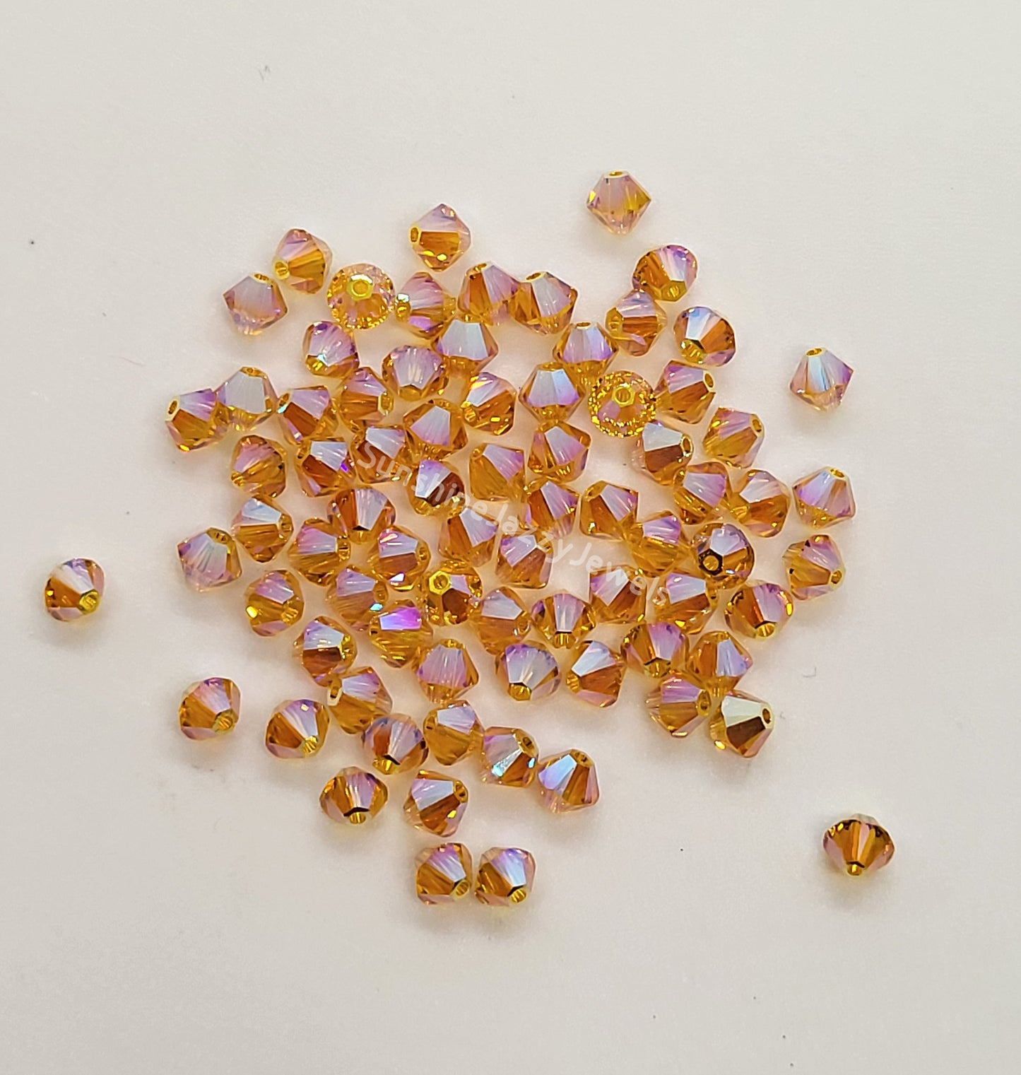 #5328 - Swarovski Crystal 4mm AB2X Bicone Beads; 24pc per pack
