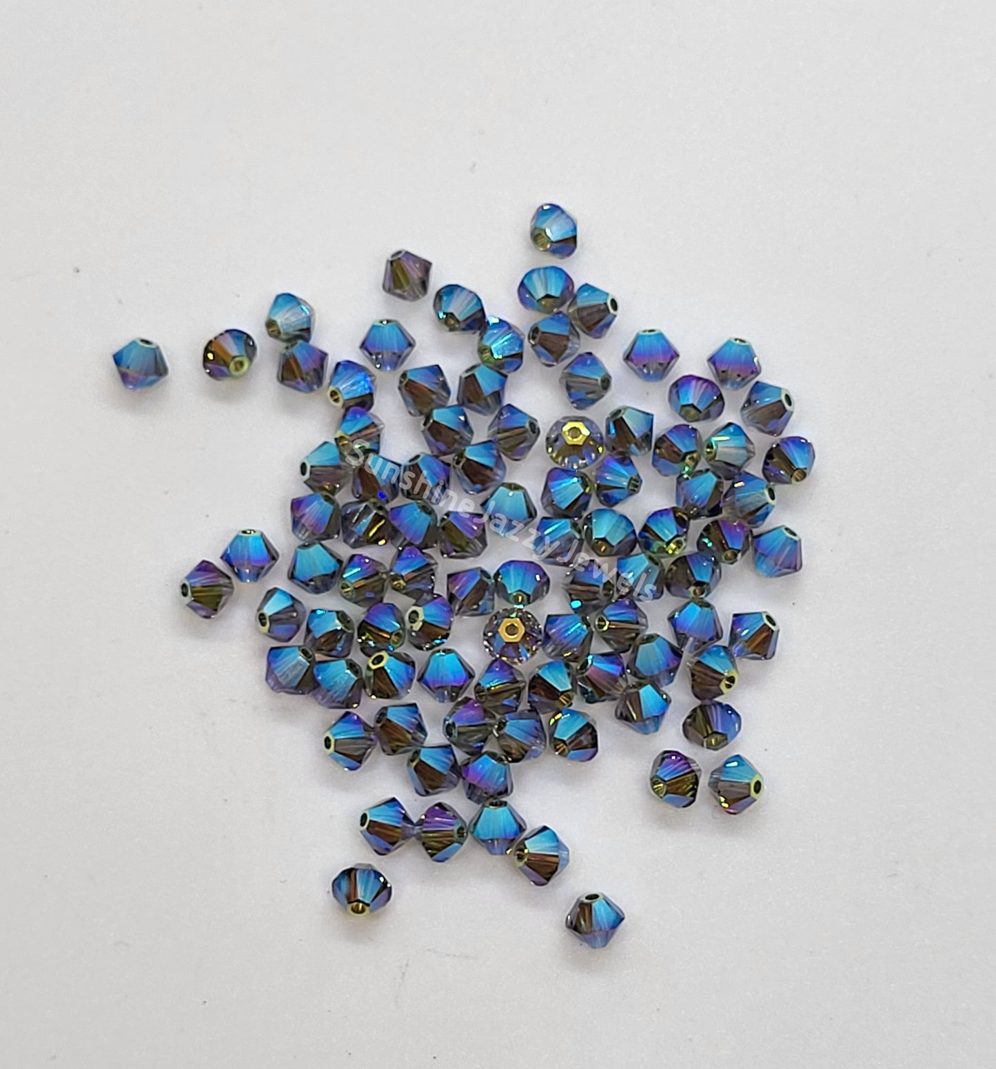 #5328 - Swarovski Crystal 4mm AB2X Bicone Beads; 24pc per pack