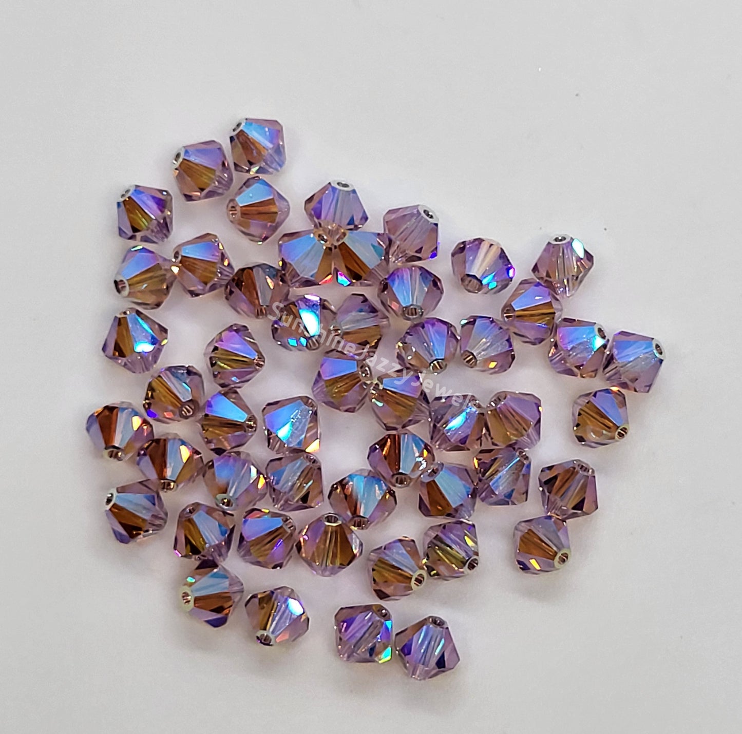 #5328 - Swarovski Crystal 6mm AB2X Bicone Beads; 12pc per pack