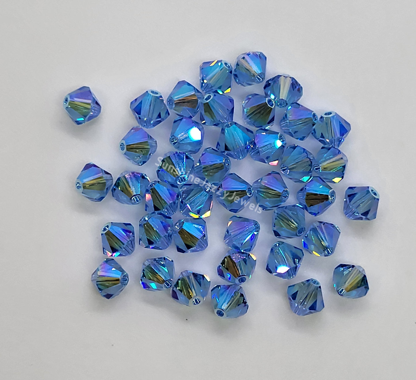 #5328 - Swarovski Crystal 6mm AB2X Bicone Beads; 12pc per pack