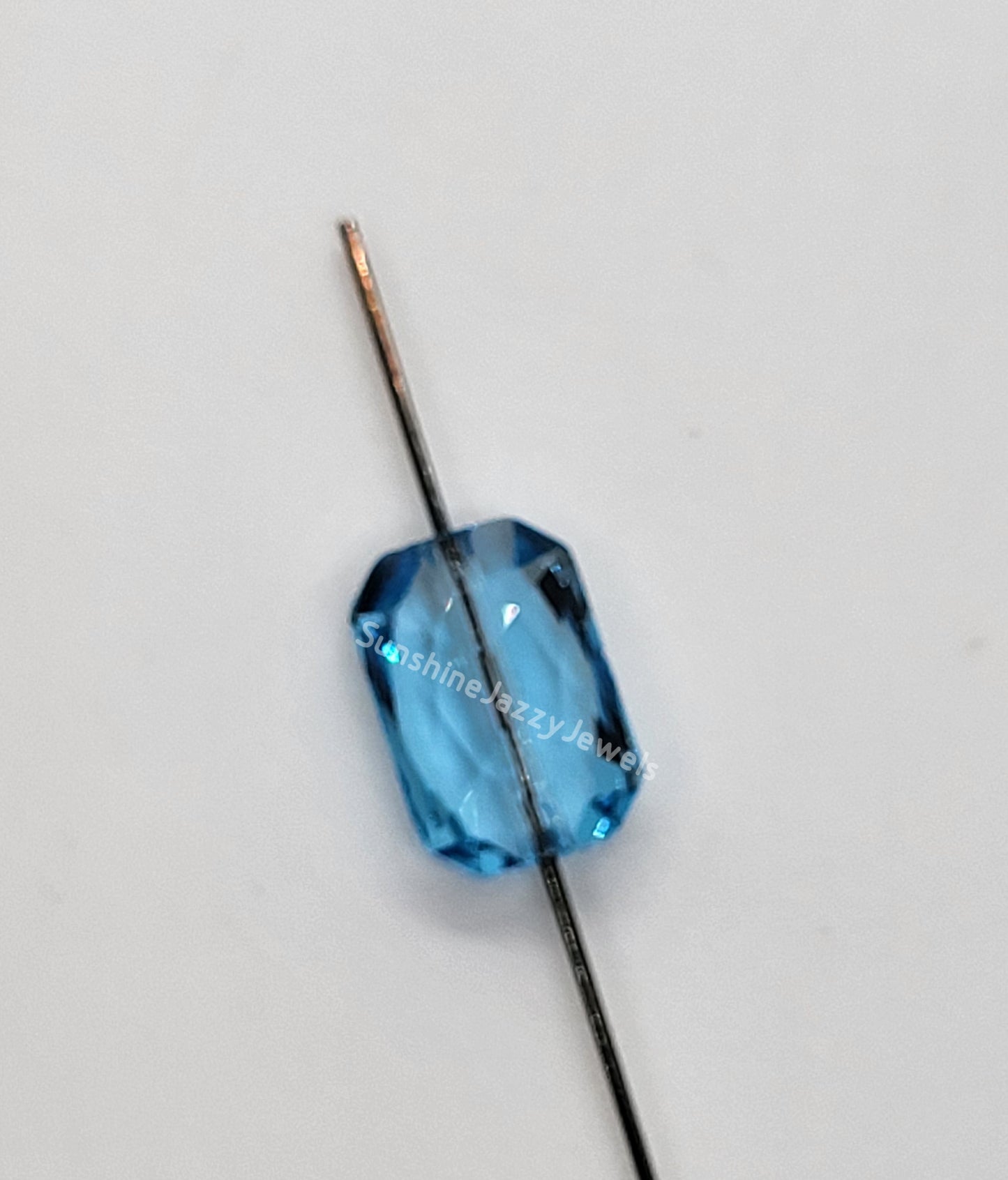 #5515 - Swarovski Crystal 14x9.5mm Emerald Cut Beads