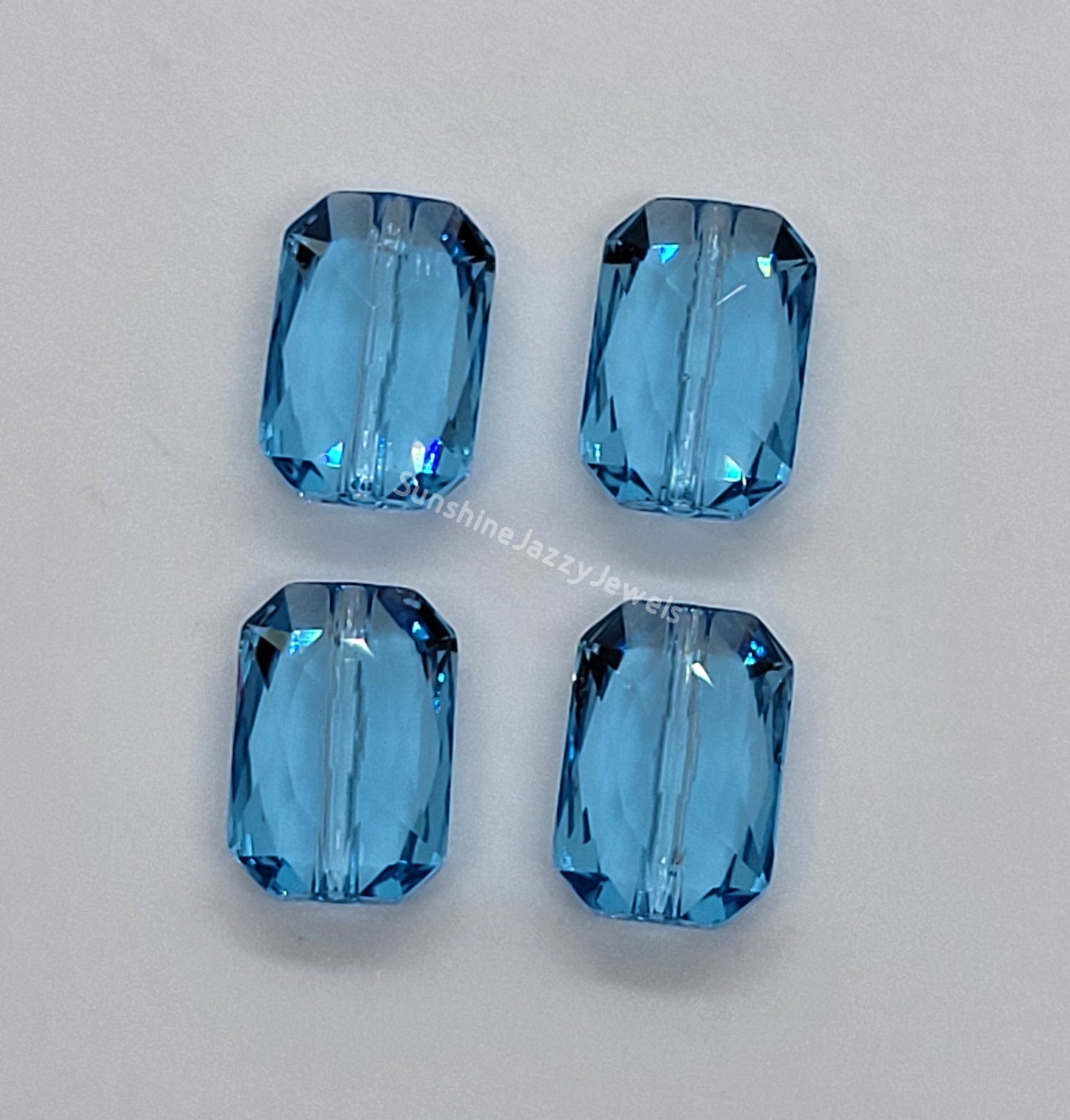 #5515 - Swarovski Crystal 14x9.5mm Emerald Cut Beads
