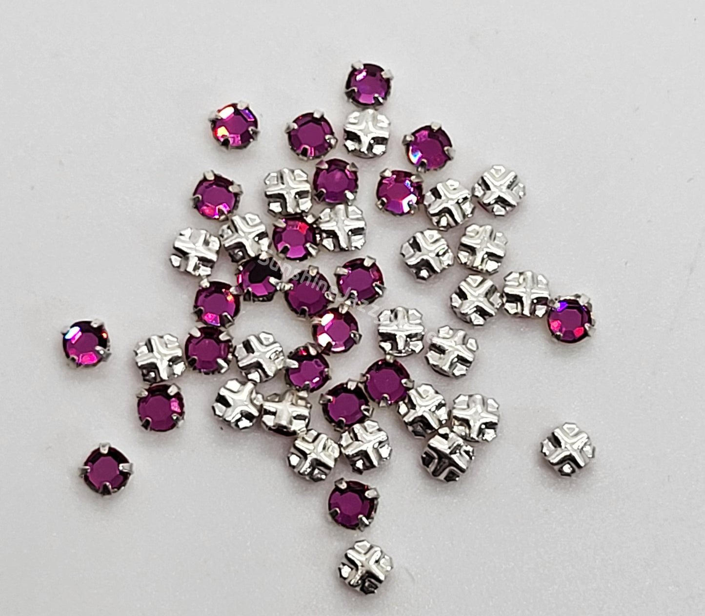 #53102 - Swarovski Crystal ss12 Rose Montees in Silver Plating; 24pc per set