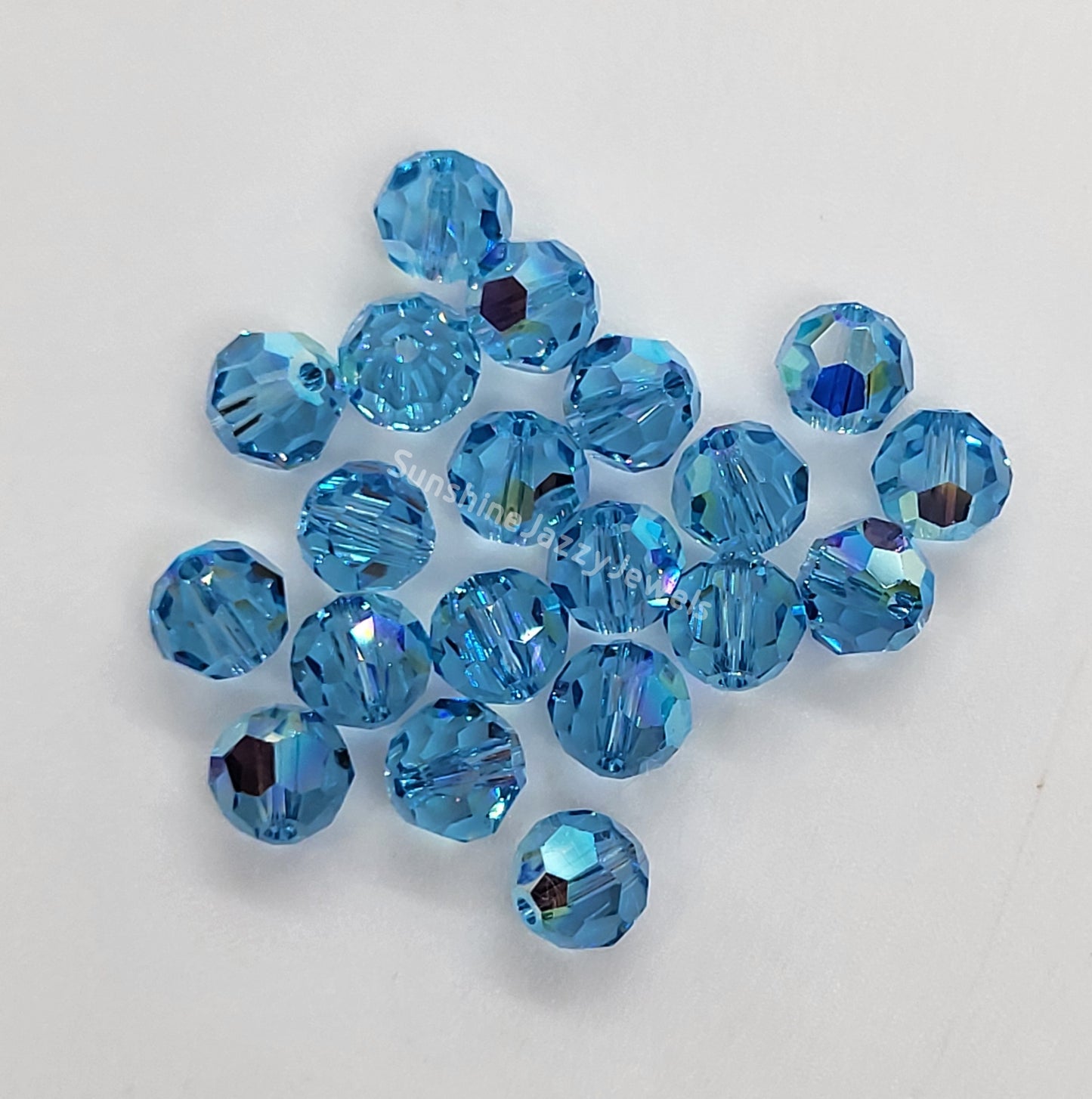 #5000 - Swarovski Crystal 6mm w/ AB Finish Faceted Round Beads; 12pc per pack
