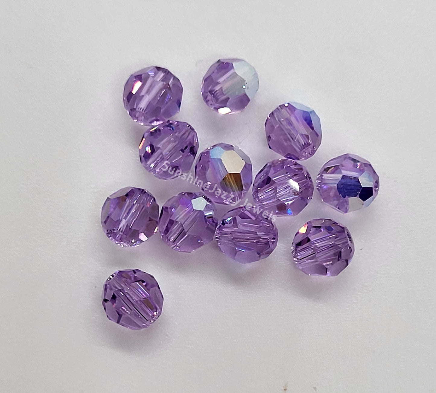 #5000 - Swarovski Crystal 6mm w/ AB Finish Faceted Round Beads; 12pc per pack