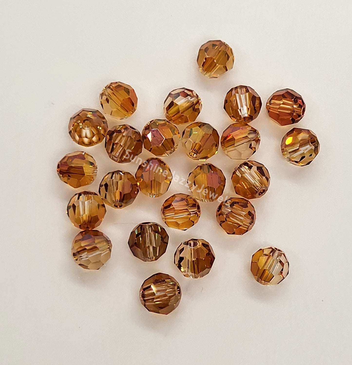 #5000 - Swarovski Crystal 6mm Faceted Round Beads w/ Crystal Effect; 12pc per pack