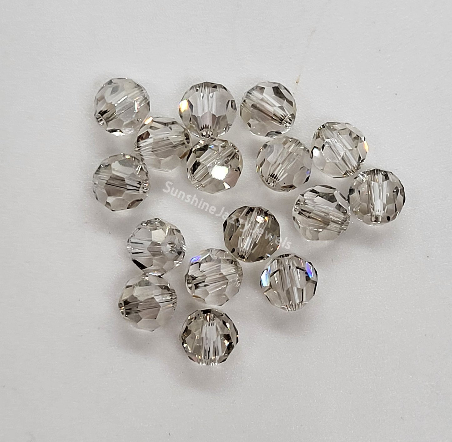 #5000 - Swarovski Crystal 6mm Faceted Round Beads w/ Crystal Effect; 12pc per pack