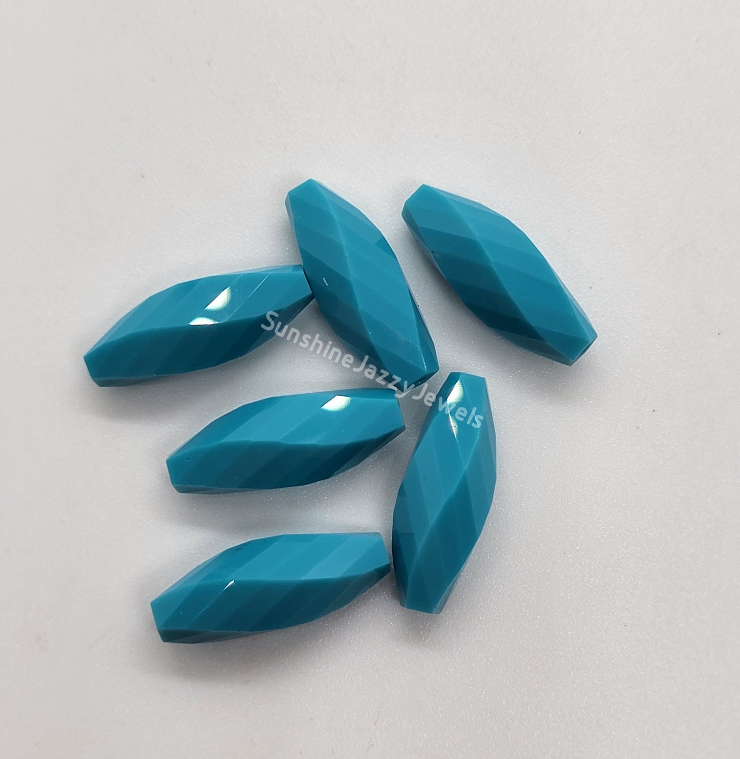 #5206 - Swarovski Crystal Twisted Oval Beads