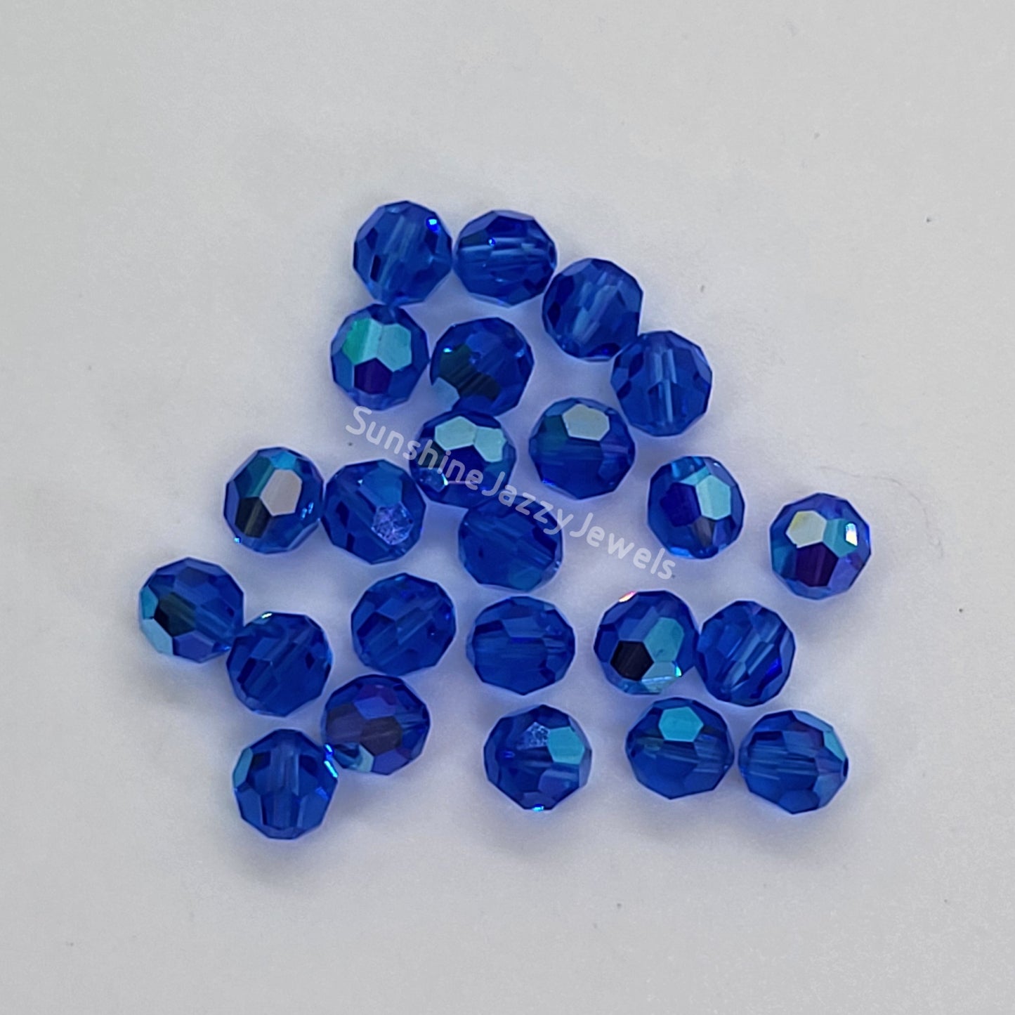 #5000 - Swarovski Crystal 6mm w/ AB Finish Faceted Round Beads; 12pc per pack