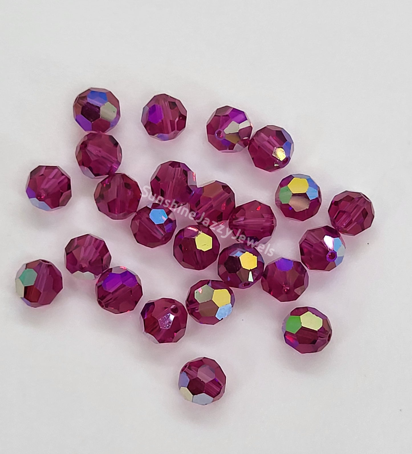 #5000 - Swarovski Crystal 6mm w/ AB Finish Faceted Round Beads; 12pc per pack