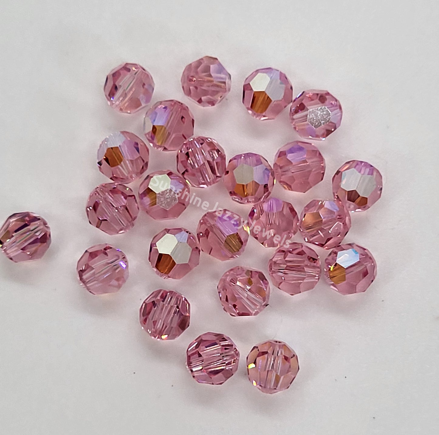#5000 - Swarovski Crystal 6mm w/ AB Finish Faceted Round Beads; 12pc per pack