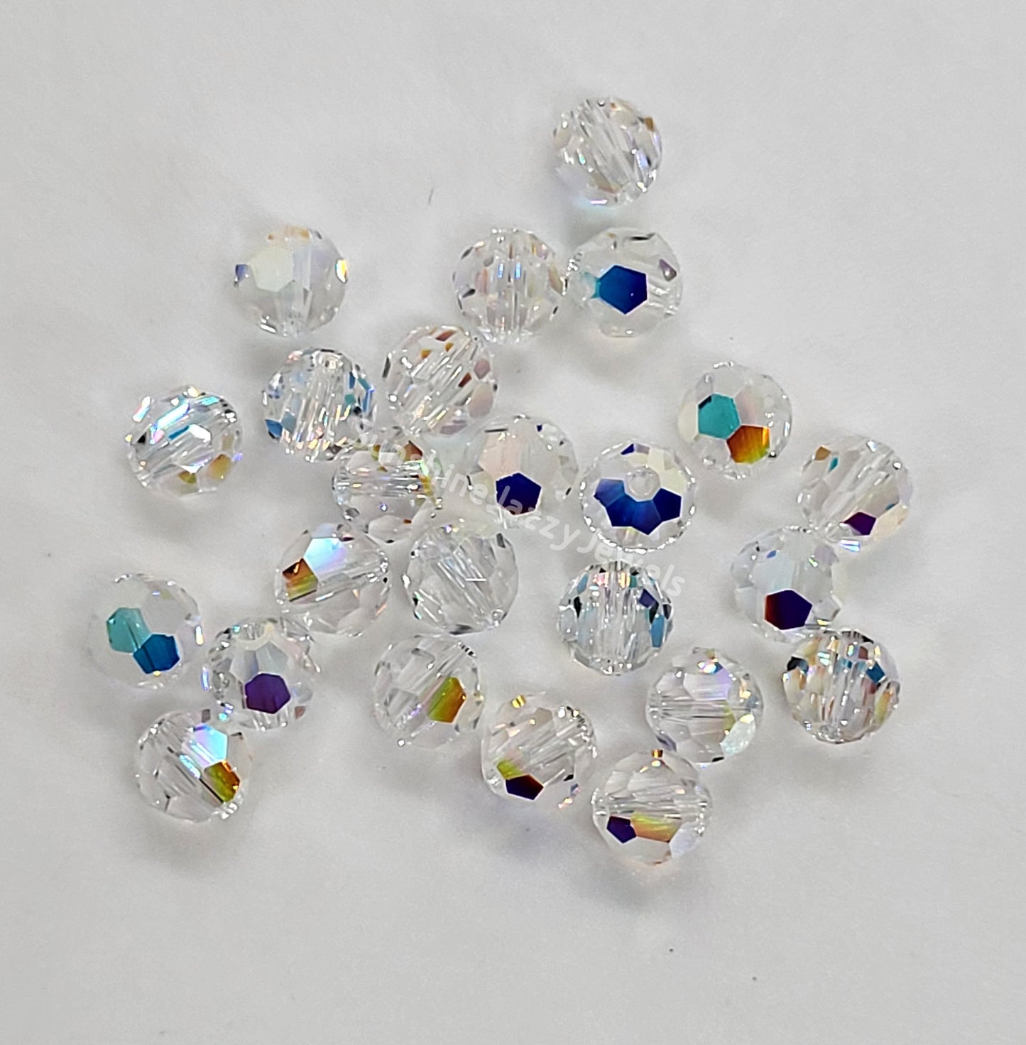 #5000 - Swarovski Crystal 6mm w/ AB Finish Faceted Round Beads; 12pc per pack