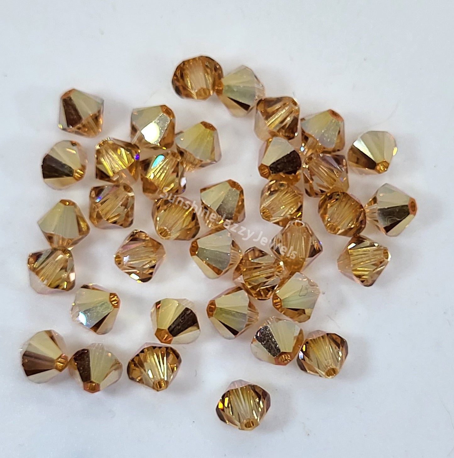 #5328 - Swarovski Crystal 6mm Bicone Beads; Crystal Effects
