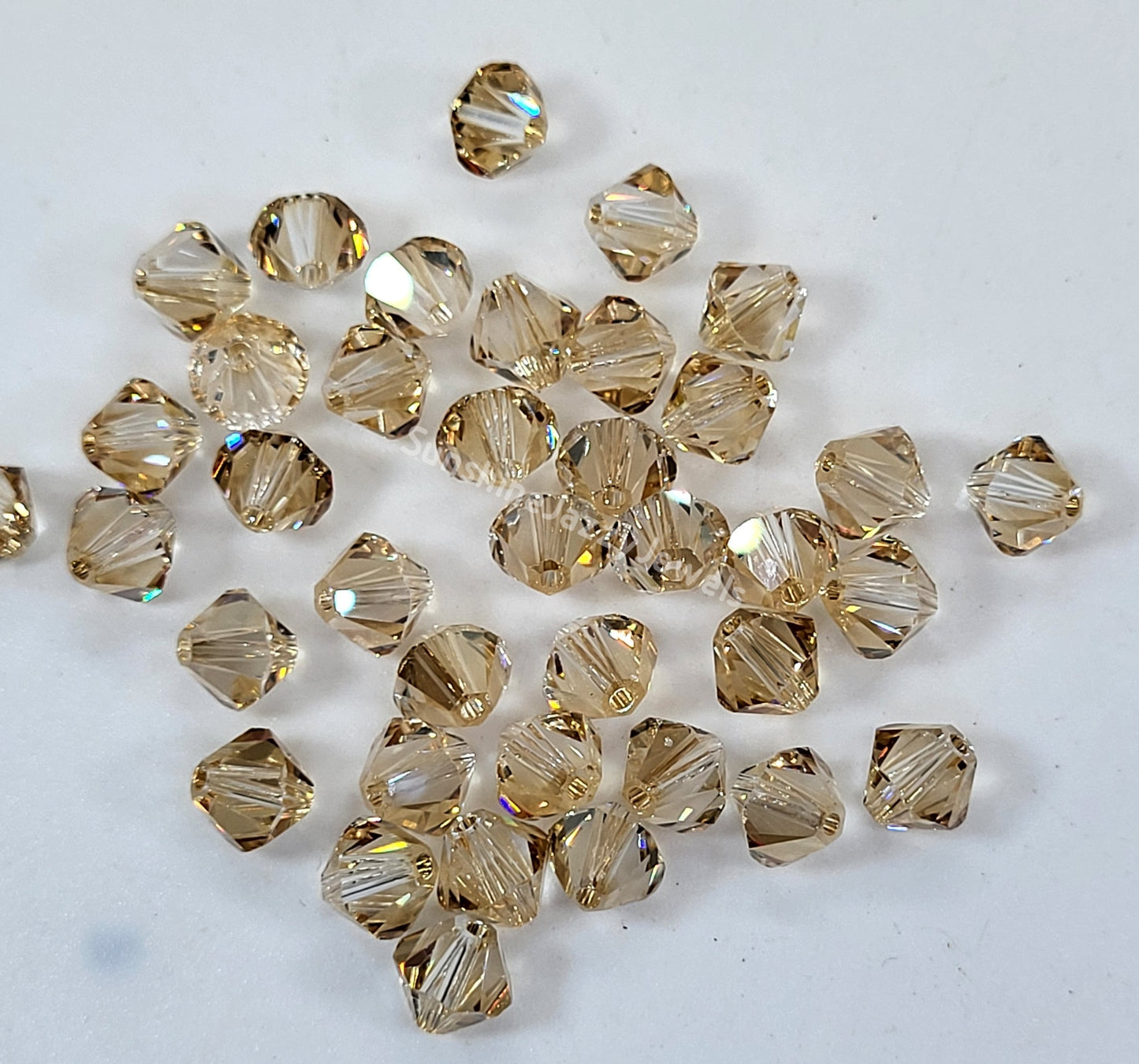 #5328 - Swarovski Crystal 6mm Bicone Beads; Crystal Effects