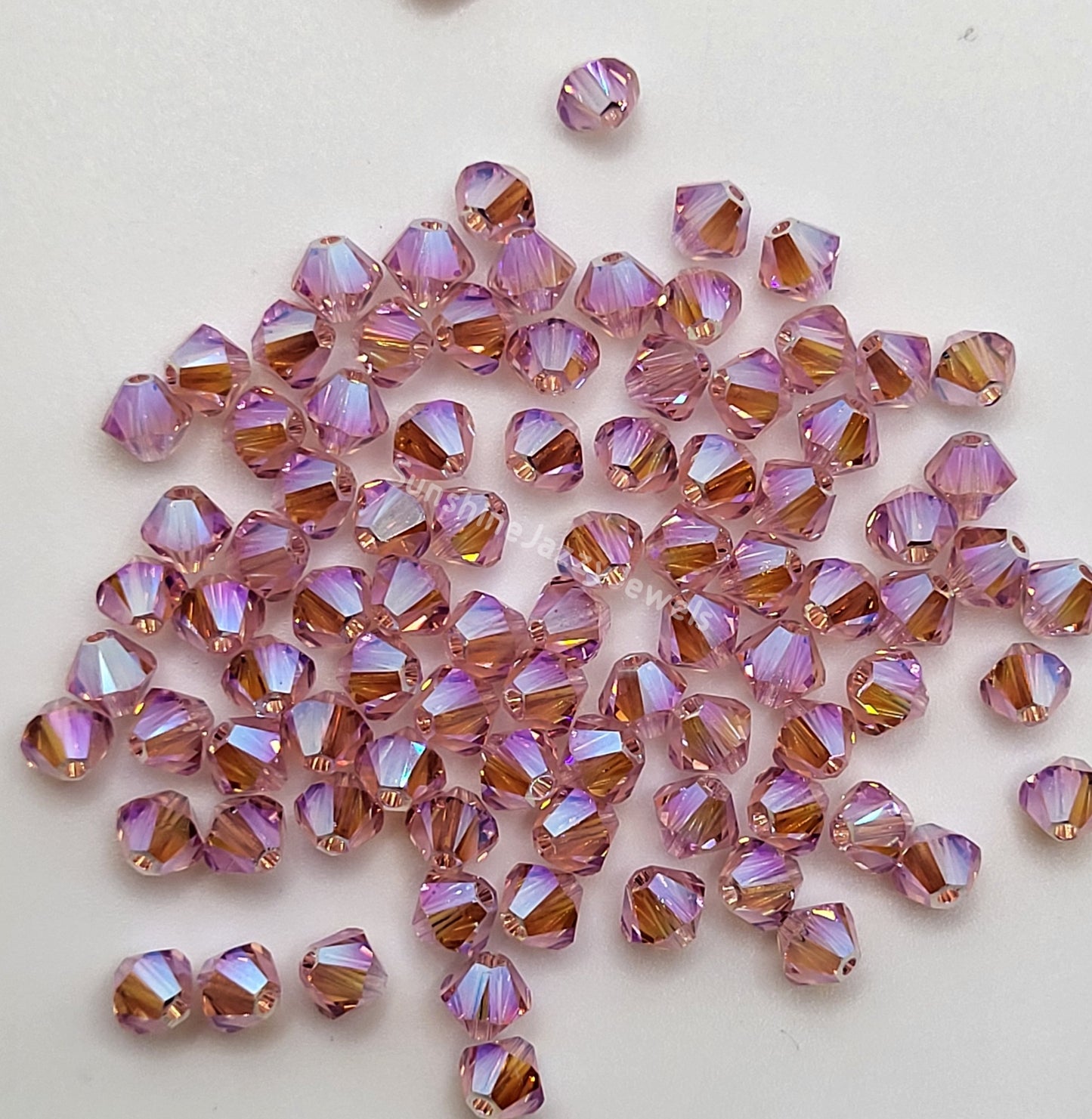 #5328 - Swarovski Crystal 4mm AB2X Bicone Beads; 24pc per pack