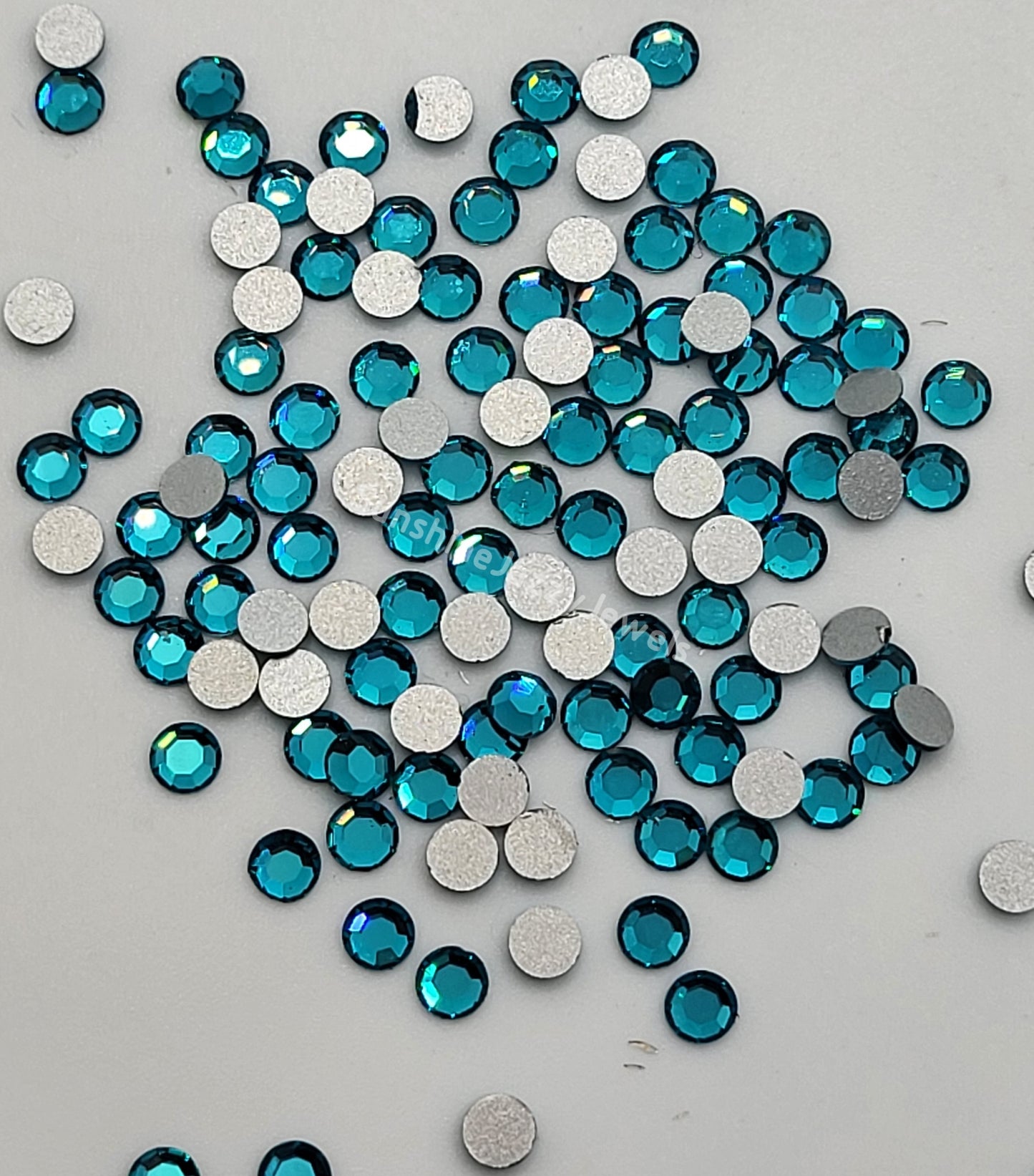 #2000 - Swarovski Crystal ss12 Round Flatback Rhinestones