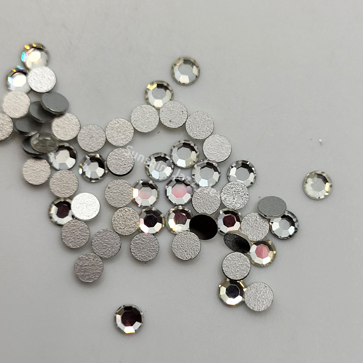 #2000 - Swarovski Crystal ss12 Round Flatback Rhinestones